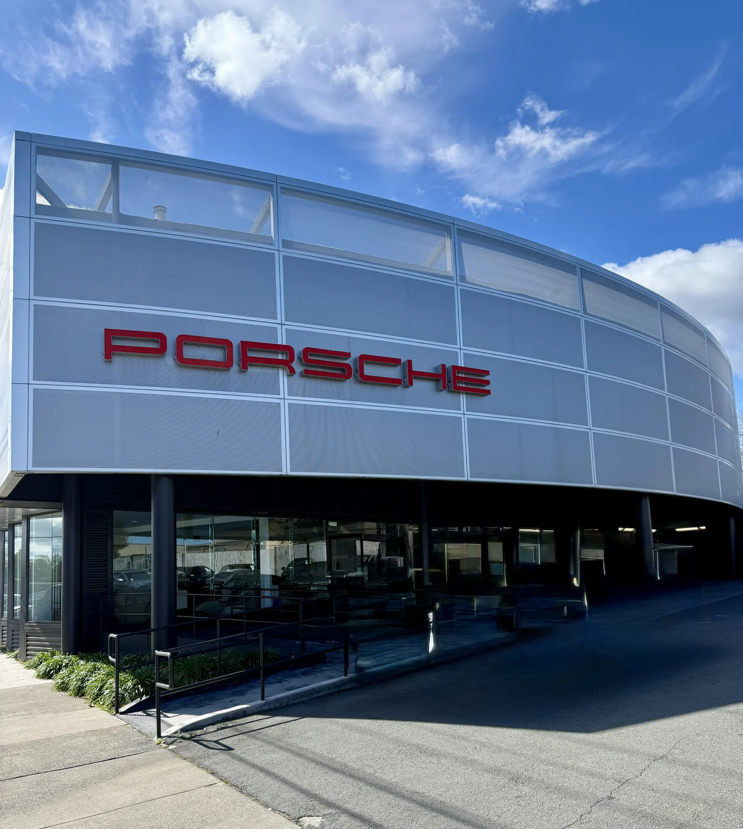 Porsche dealership facade — Rednic Construction
