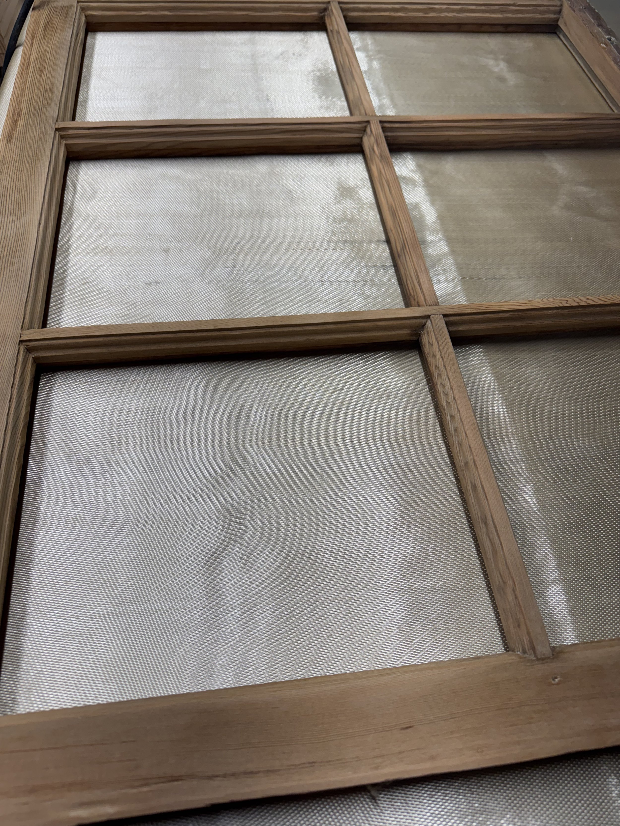 A fully stripped and smoothed sash window ready for paint.