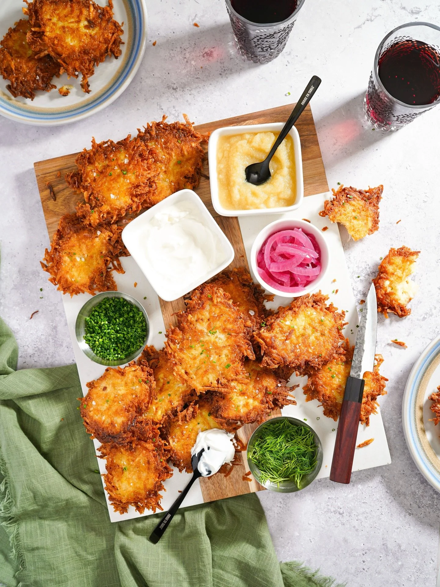 Shamelessly cooking and indulging in all my favorite foods and snacks this holiday season, including this big batch of extra-crispy latkes for Hanukkah.

This year, they stayed shatteringly crunchy even an hour post-frying. After soaking the shredded