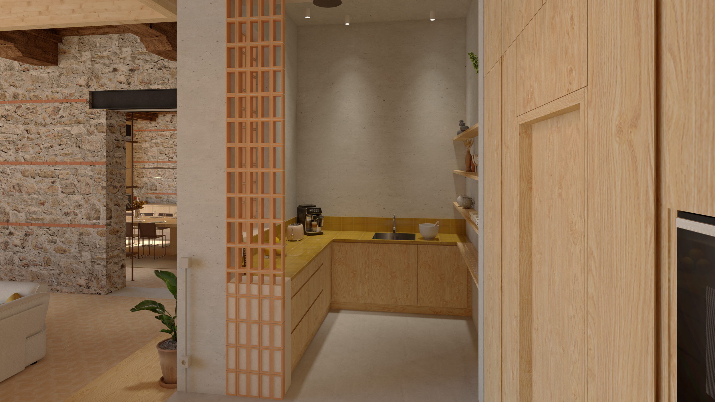 A l'intérieur même des cuves, la cuisine s'articule autour de deux modules d'angle en pin massif : l'un pour l'évier, l'autre pour la cuisson.