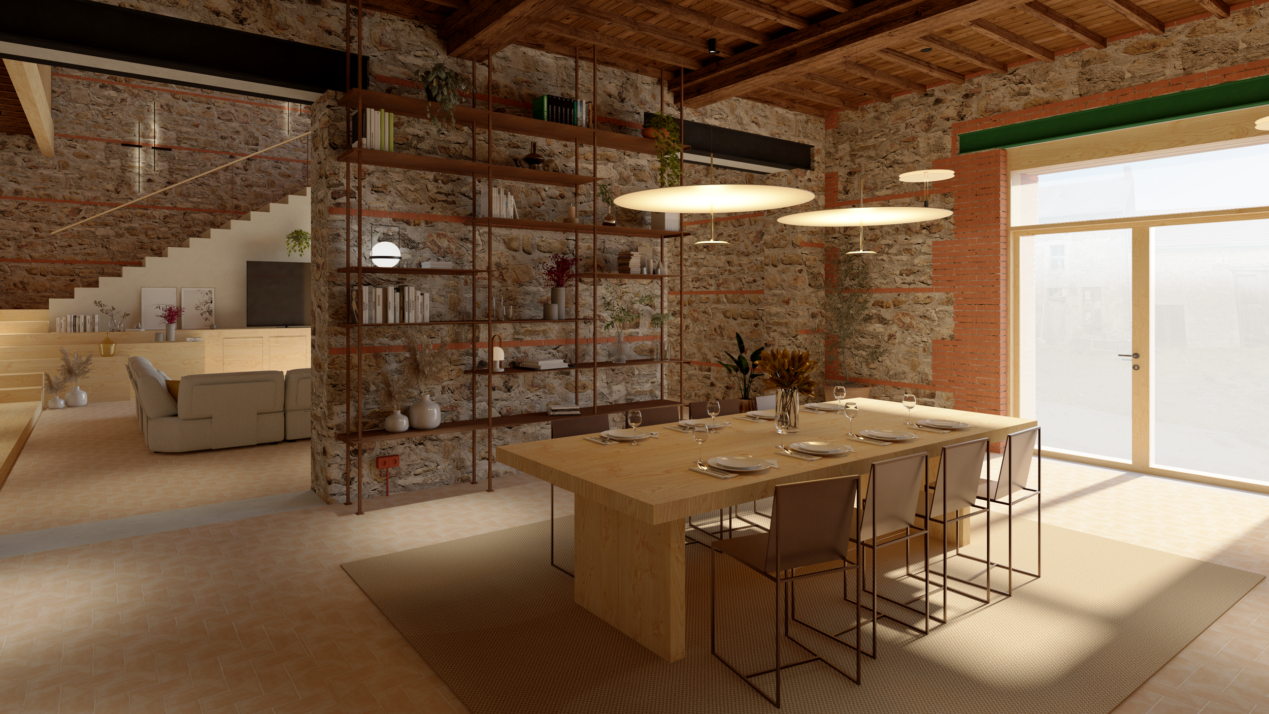 La connexion entre les deux bâtis existants est assurée par la création de deux ouvertures dans le mur mitoyen. La bibliothèque filaire en acier corten s'efface subtilement dans le mur en pierre.