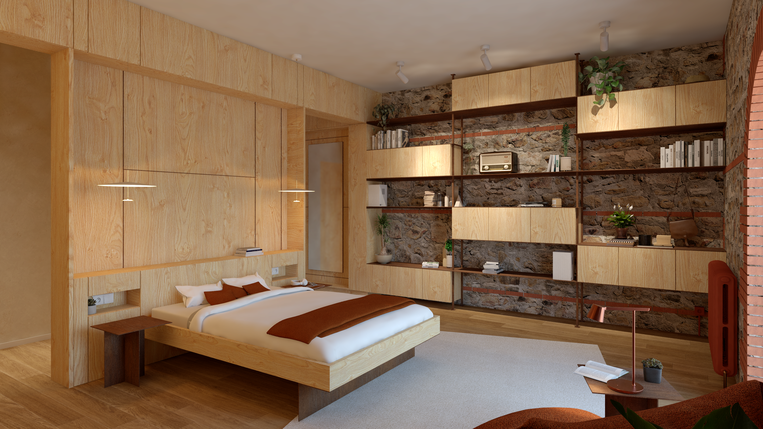 La pierre s'expose, le pin massif structure, et l'acier corten ponctue avec précision. La chambre de Gabrielle s'organise autour d'une tête de lit architecturale, toute hauteur, qui scinde l'espace sans le fermer.