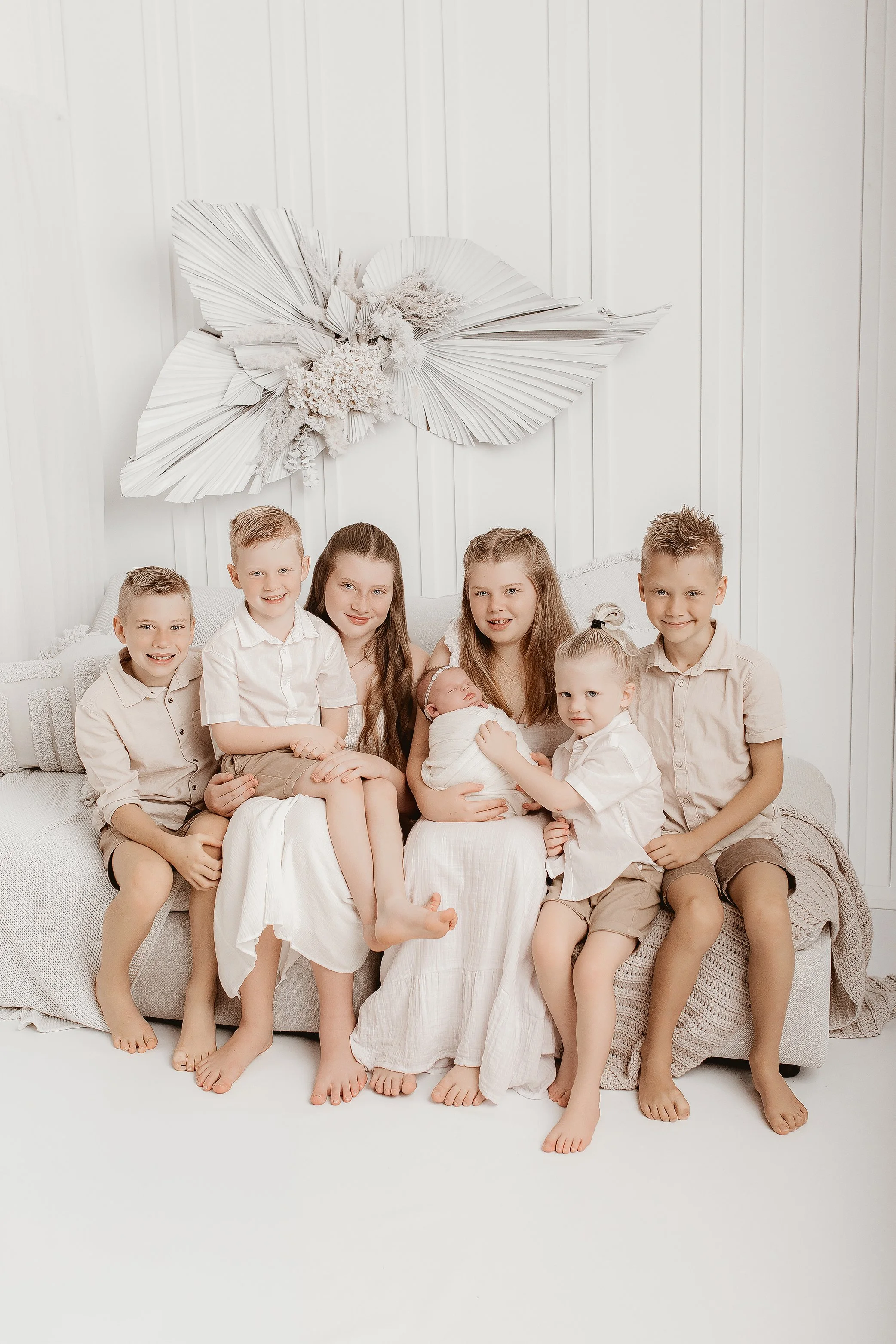 Natural family connection with newborn baby photographed in Ipswich QLD