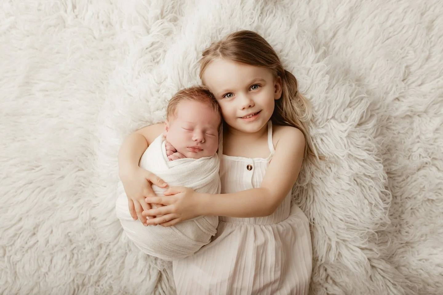 Tiny arms, a brand-new world&hellip; and the biggest job of all 🤍
A big sister holding her newborn brother &mdash; already his comfort, his protector, his very first best friend.
These are the moments that become forever.

If you&rsquo;re expecting,