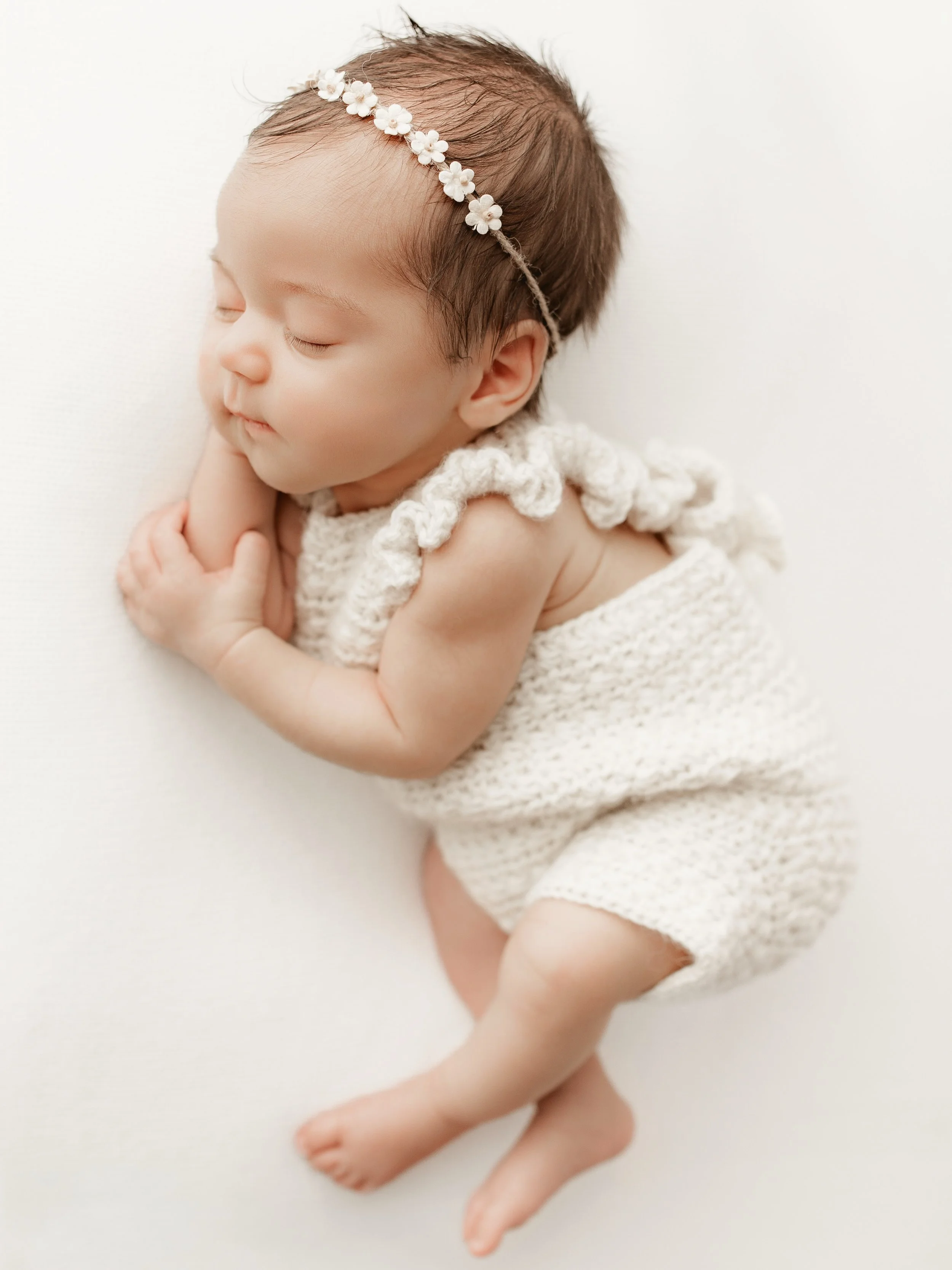 I couldn&rsquo;t pick a favourite so here&rsquo;s three stunning images of this sweet girl 🕊️

Wearing the Aurora romper from @lmhandmade.creations 🤍
Dainty floral handband by @handmadeheadbandsbysarah 🌸

For more information + bookings, head to w
