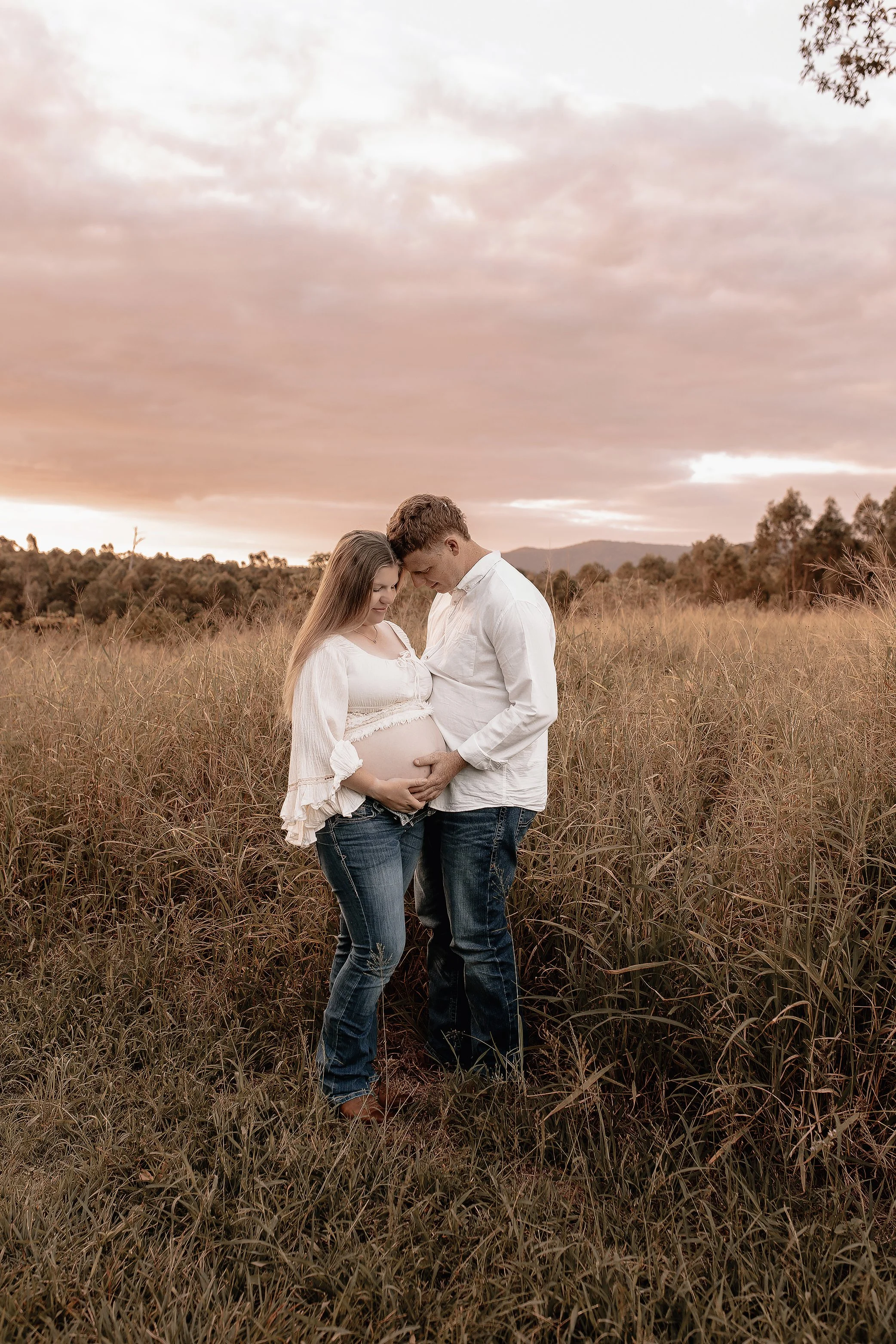 Ipswich outdoor maternity photography with soft light and natural tones