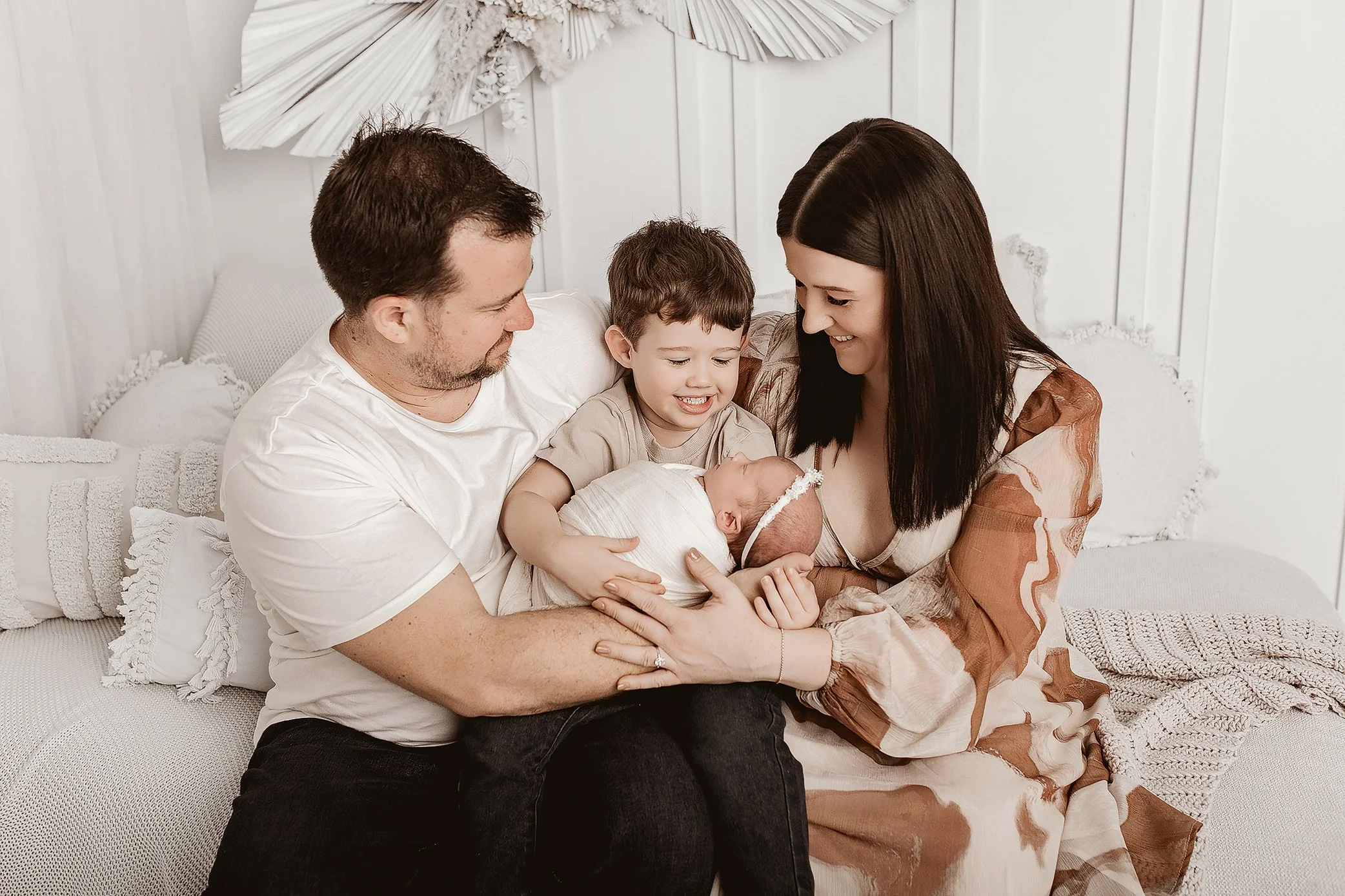 Natural family connection with newborn baby photographed in Ipswich QLD