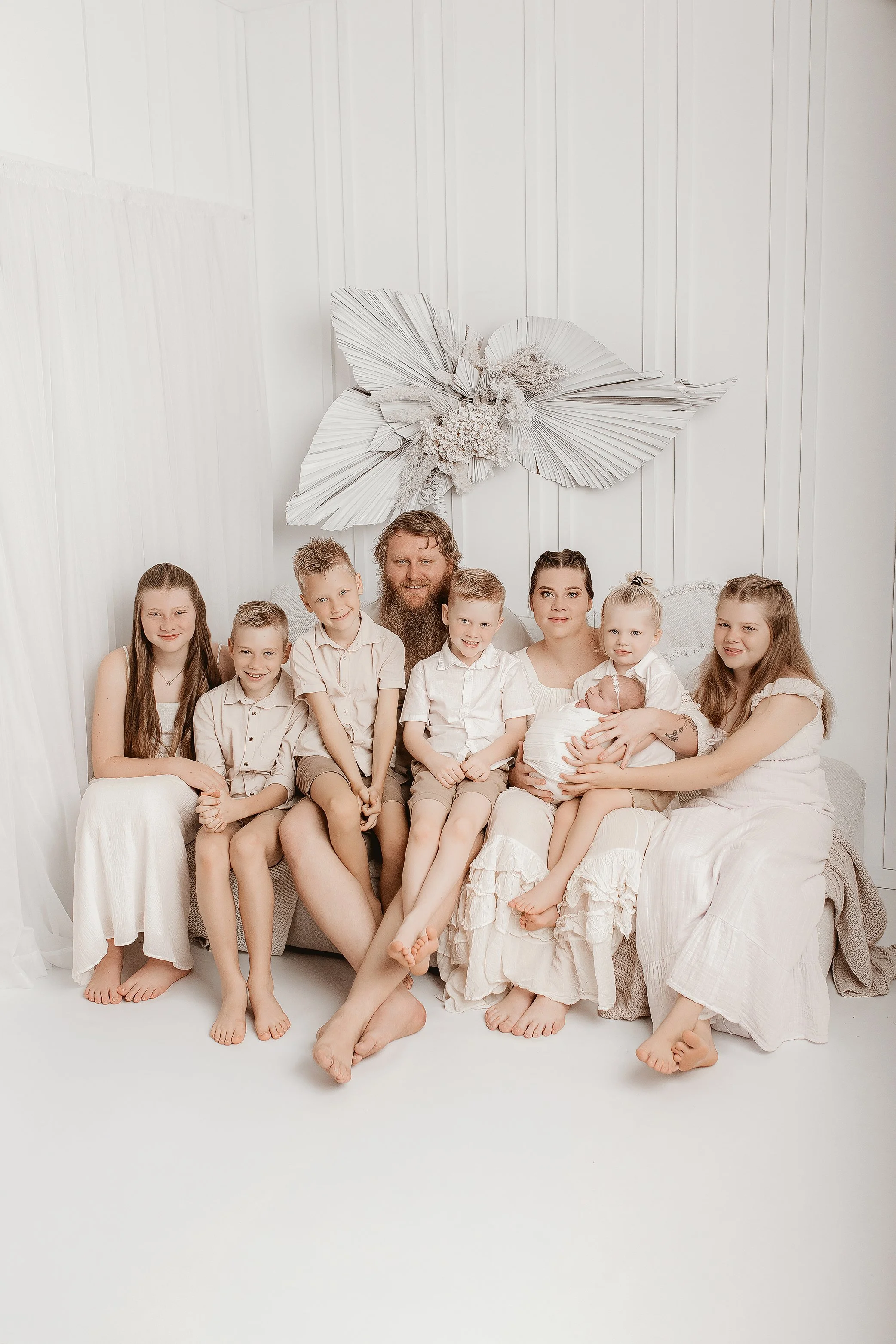 Natural family connection with newborn baby photographed in Ipswich QLD