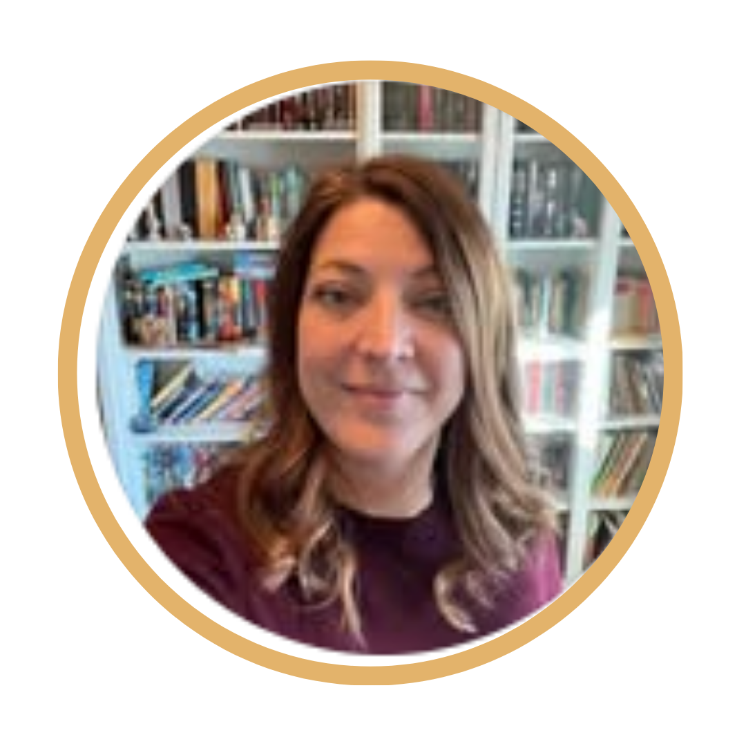 Person in a room with a bookshelf in the background