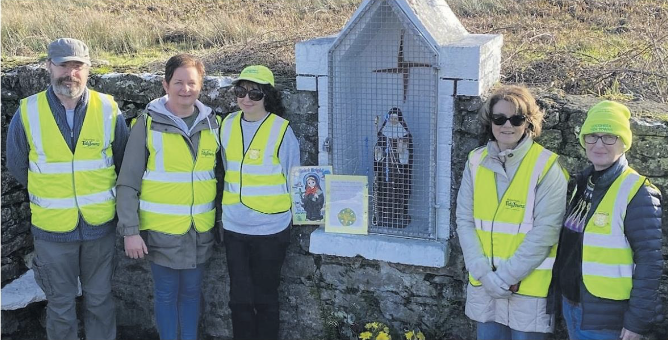  Loughrea Tidy Town Chairperson Isabelle Ni Dhuinn (right) with Tidy Town volunteers Aidan Conlon, Michelle Bateman, Cathriona McLoughlin and Breda McGuinness at the restored St. Brigid's Well. 
