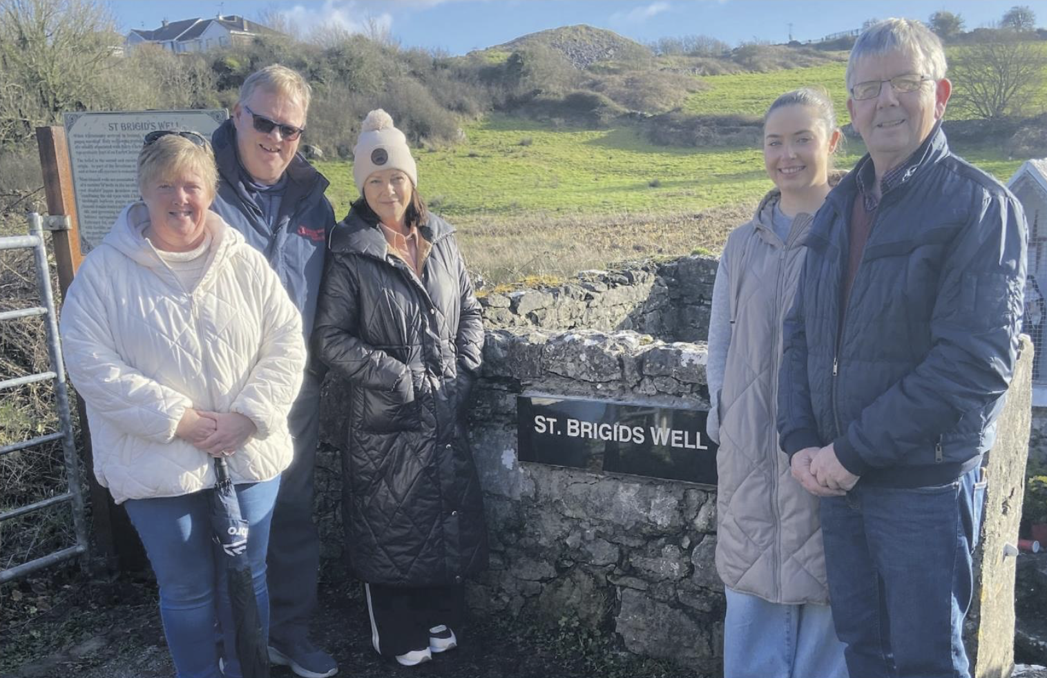  The late Syd Kelly's children Sorcha Kennedy, Declan Kelly and Sinead Murray, with Syd's grand- daughter Sarah Murray and Gabriel Burke who has played such an integral part in the restoration of St. Brigid's Well. 