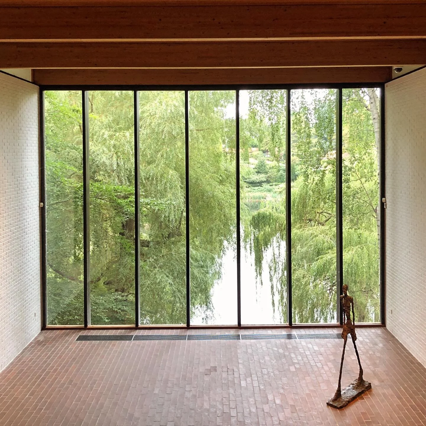 Walked through Louisiana&rsquo;s glass corridors between pavilions, each turn reframing the view from landscape to art and back again. 

Louisiana Museum of Modern Art. J&oslash;rgen Bo and Vilhelm Wohlert, 1958. The building unfolds as a sequence of