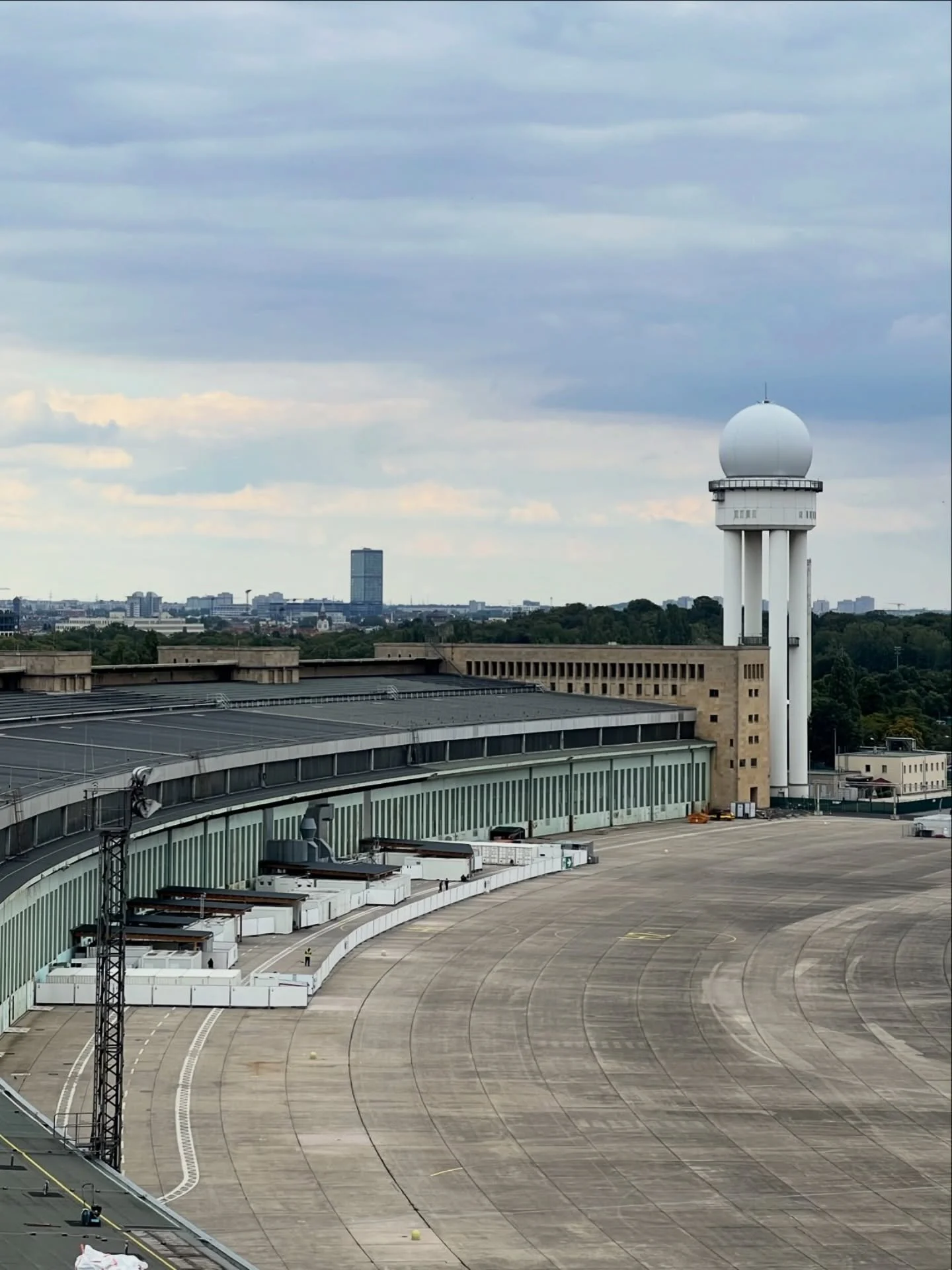 How do you build a monument to air travel? Tempelhof&rsquo;s answer was scale. 

Designed by Ernst Sagebiel during the Nazi regime, the building stretches 1.2 km, with a limestone facade and a 40m deep canopy sheltering passengers from the weather. T