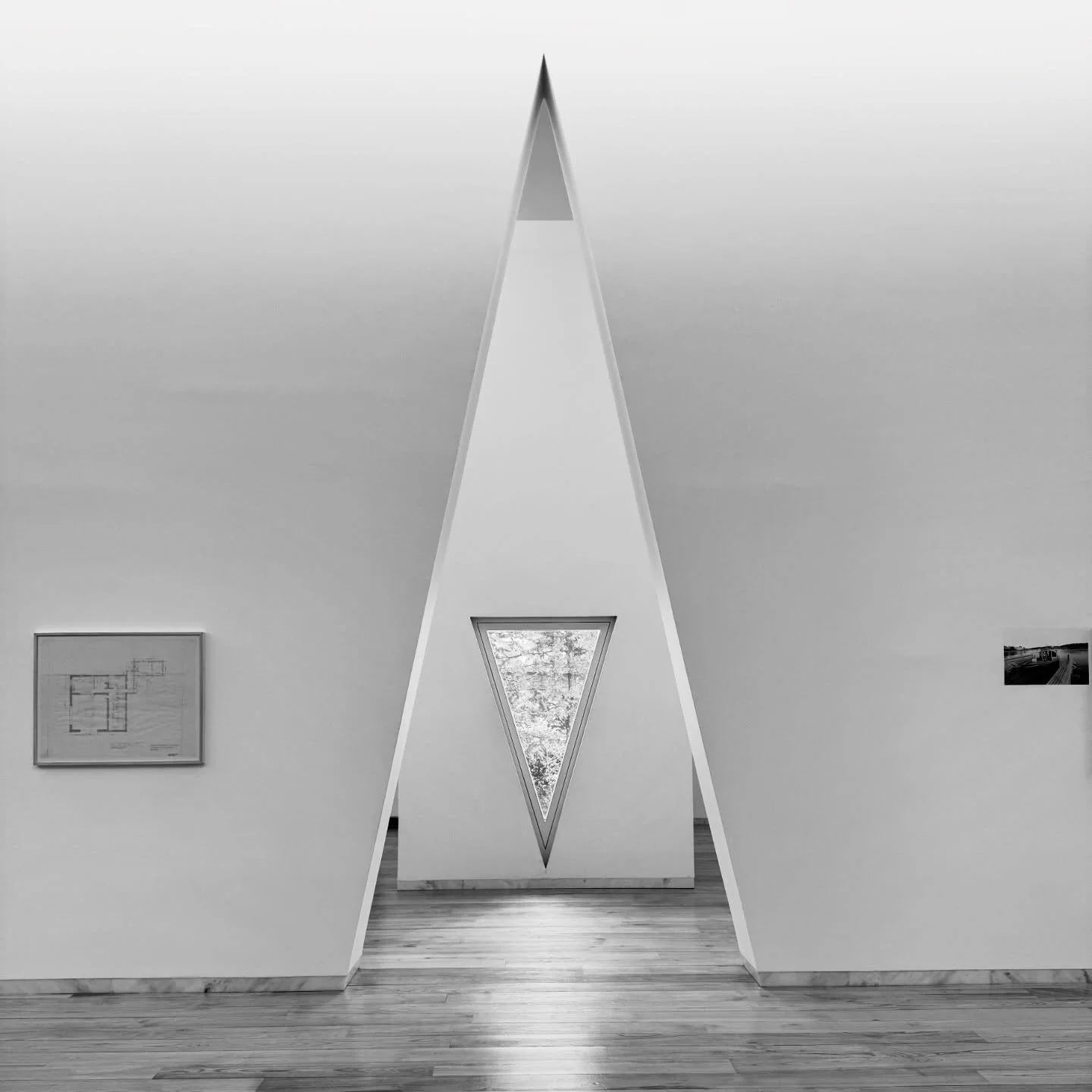 &Aacute;lvaro Siza, born 1933, is Portugal&rsquo;s most celebrated architect. A Pritzker Prize laureate and central figure of late modernism.

At the Serralves Museum (Porto, 1999), a triangular portal cuts through the gallery wall. Its inverted echo
