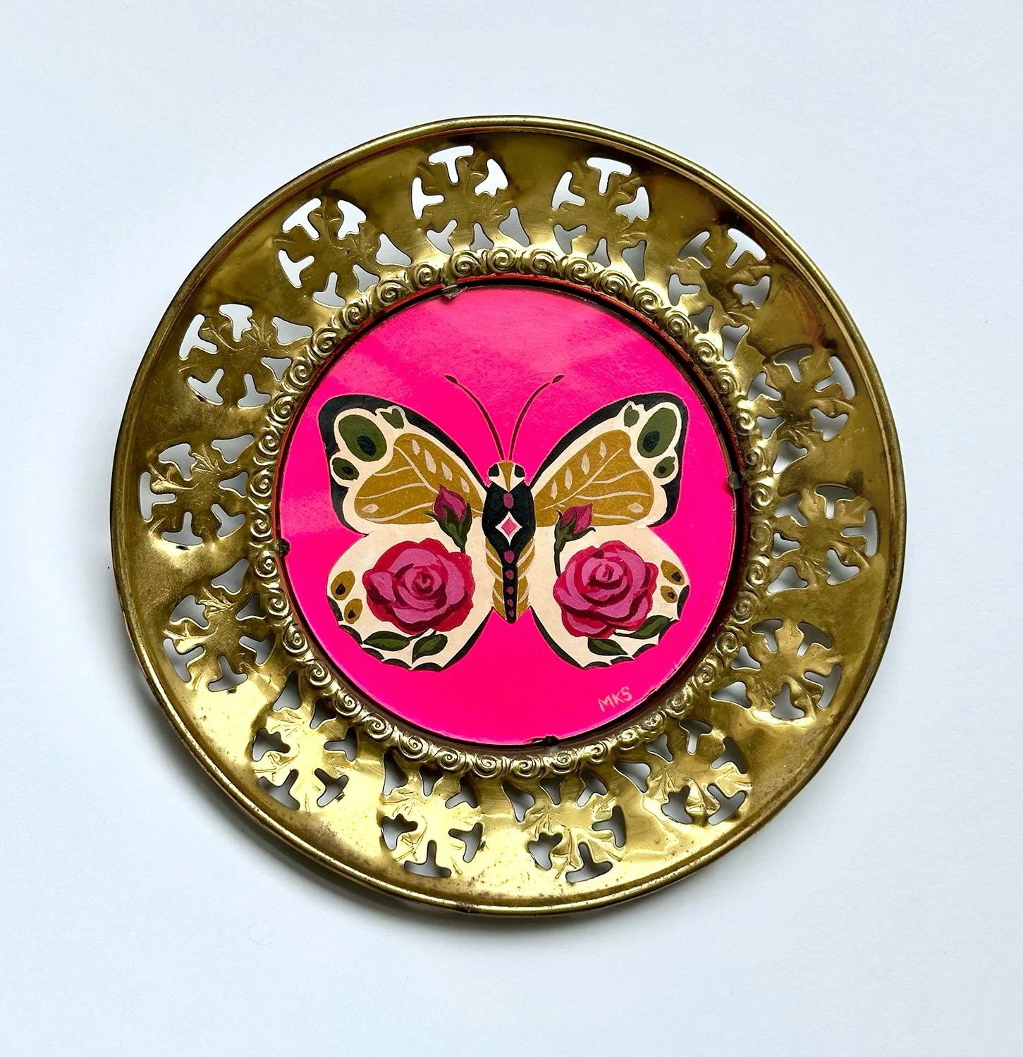 Gouache butterfly in circle frame.
