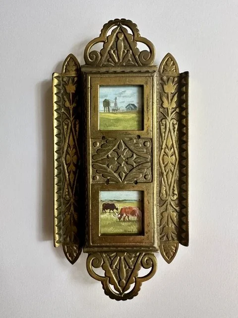 Miniature Midwest scenes in a brass antique frame. 1 1/4 inch squares. Frame is 8 1/2 x 4 1/2.