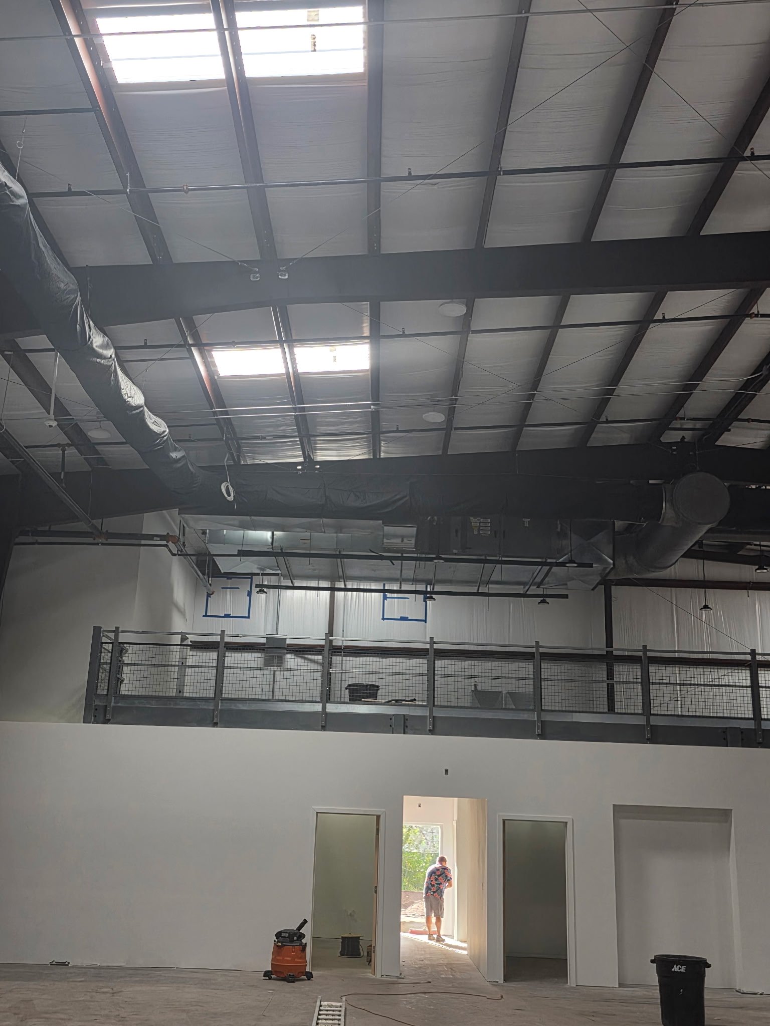 Mezzanine above offices and yoga room