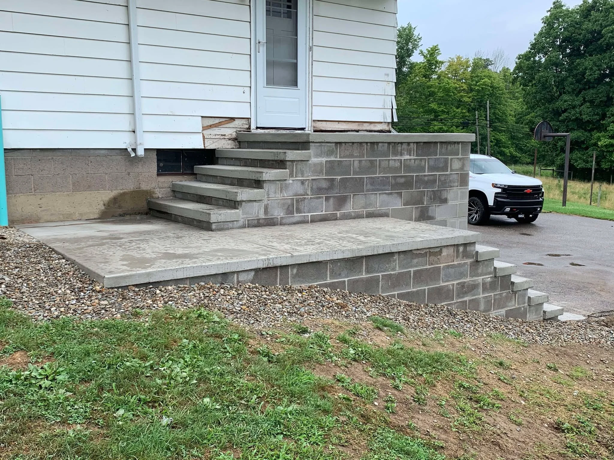 exterior-stairs-concrete-pad.jpg