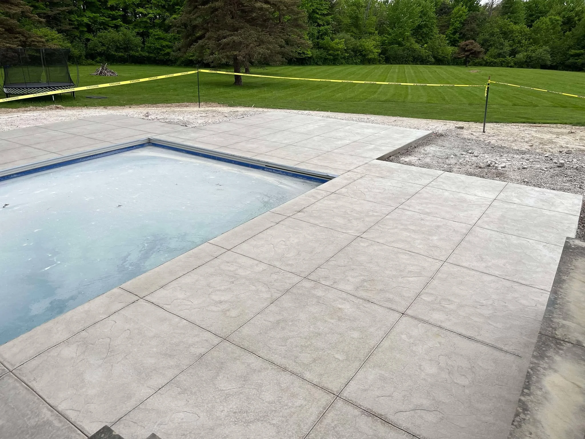 stamped-concrete-pool-deck-square-pattern.jpg