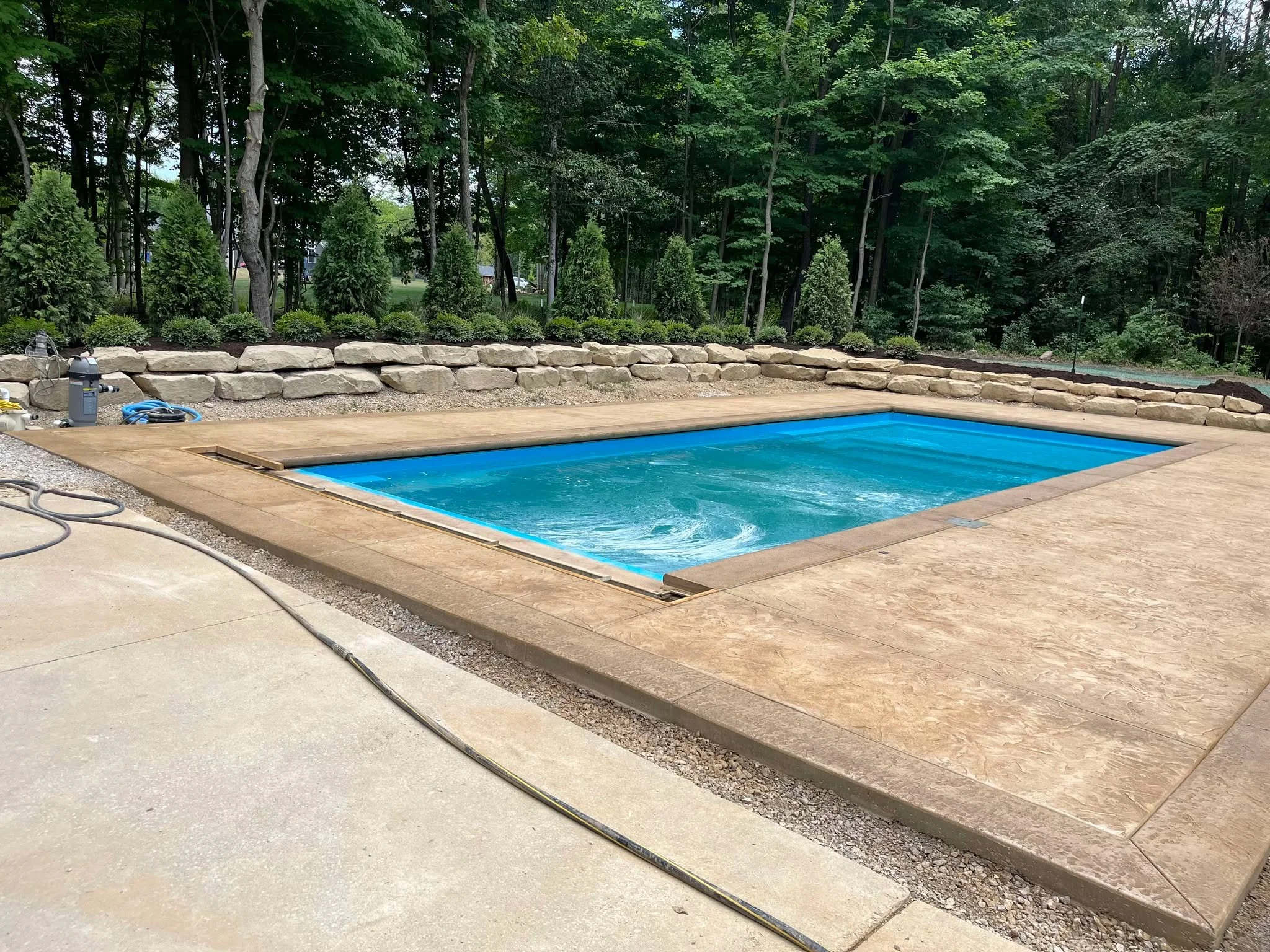 stamped-colored-concrete-decorative-pool-deck.jpg