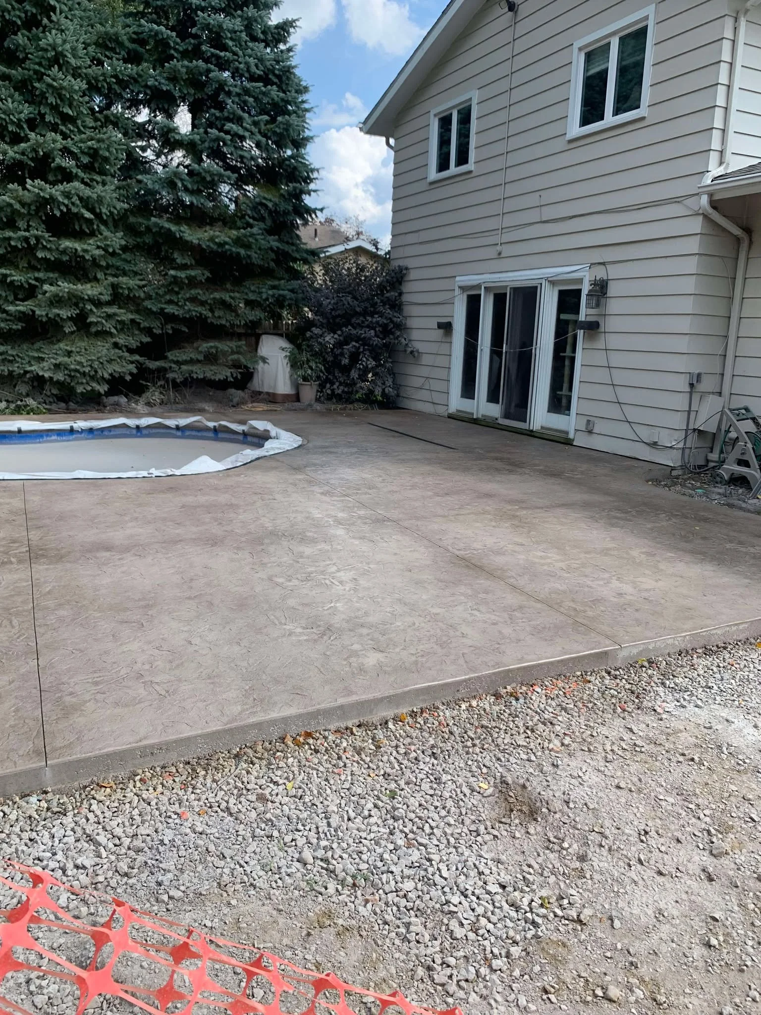 stamped-concrete-pool-deck-residential-home.jpg