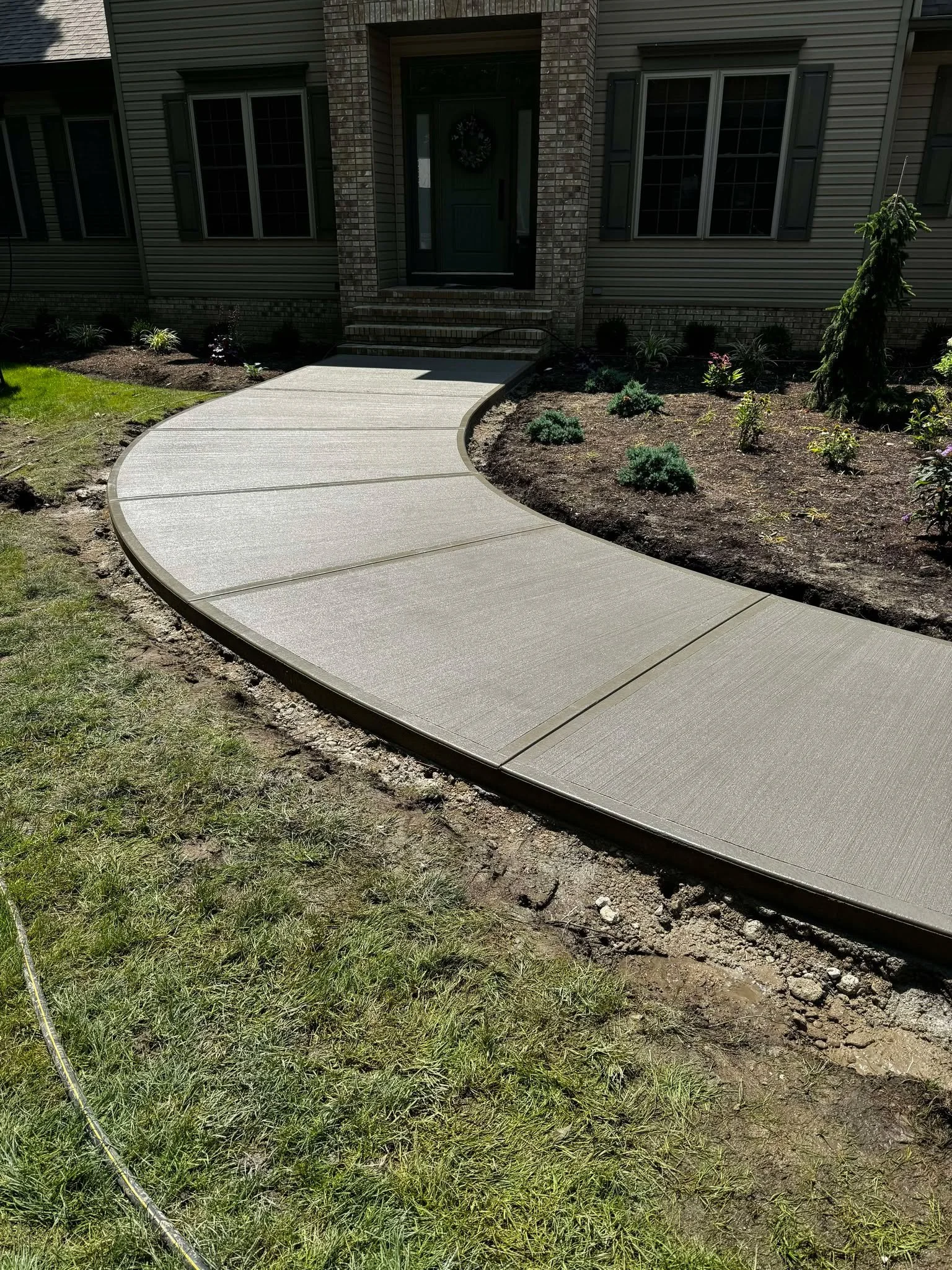 curved-concrete-sidewalk.jpg