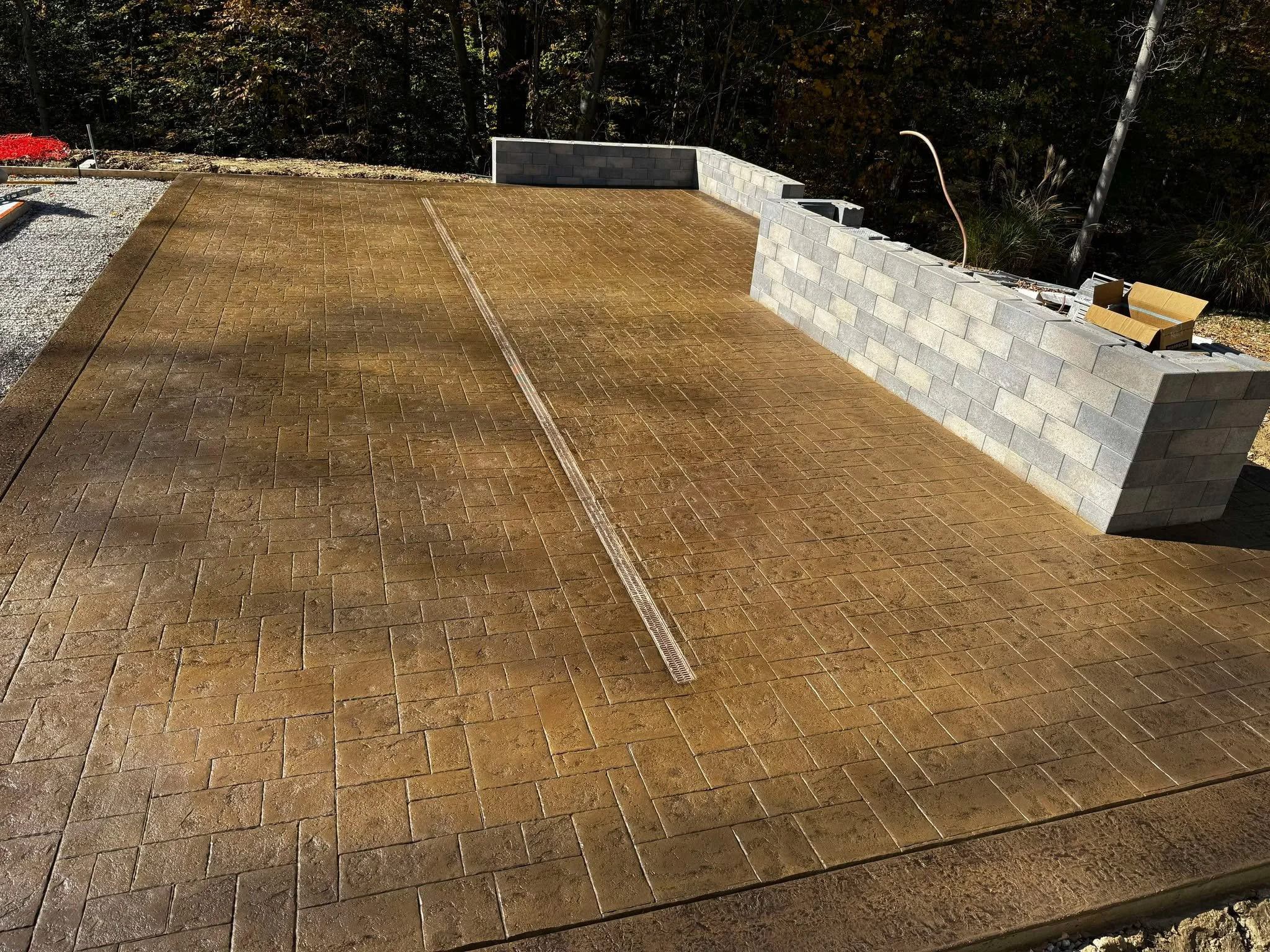 stamped-pavers-concrete-drain-patio.jpg