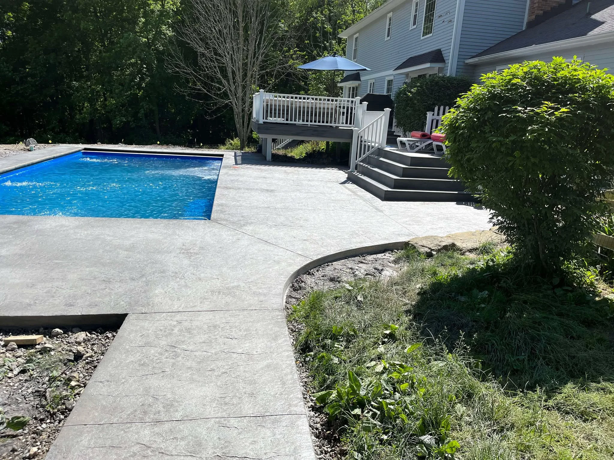 stamped-concrete-walkway-pool-deck-patio.jpg