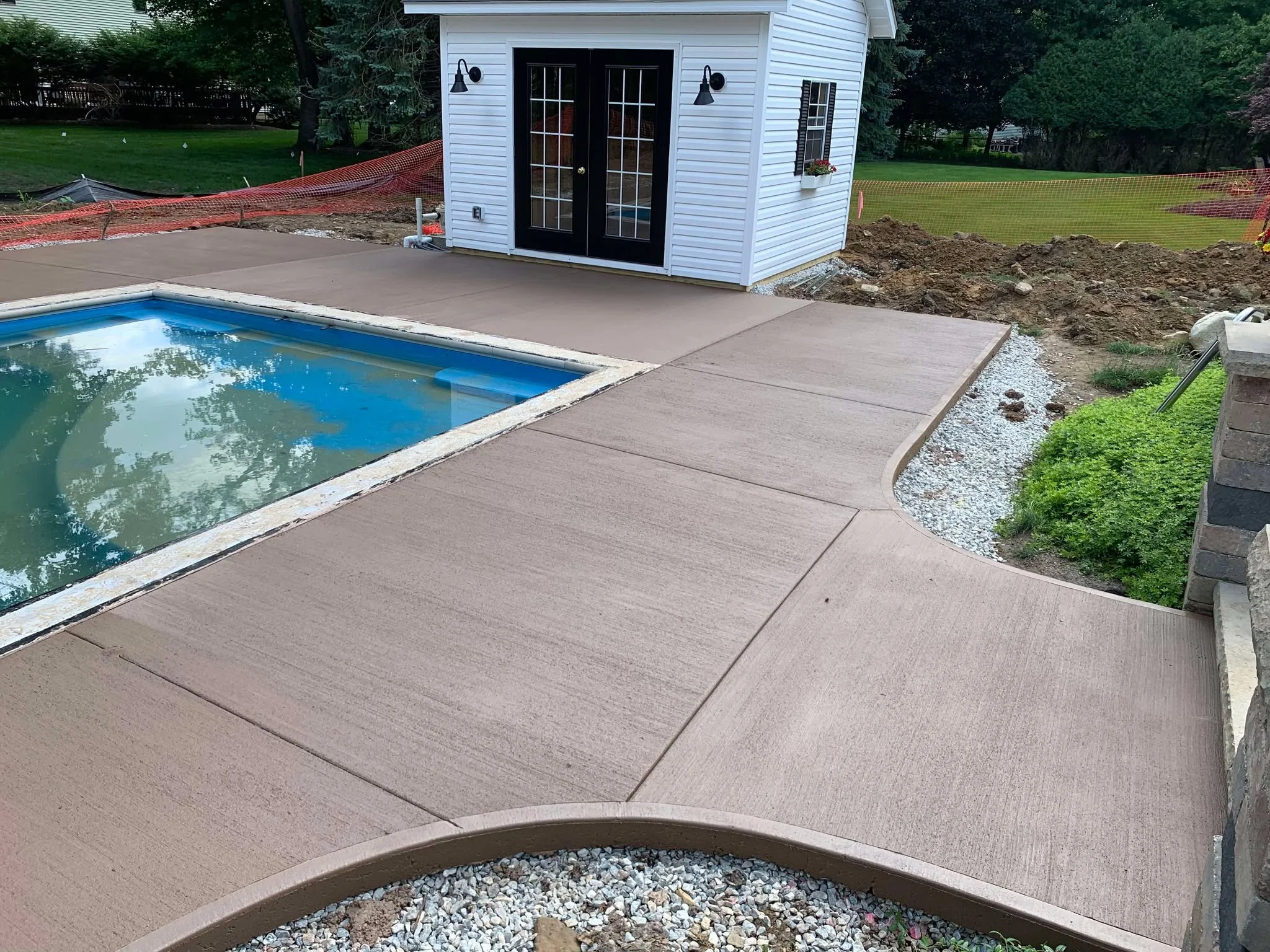 pool-patio-design-brushed-concrete.jpg