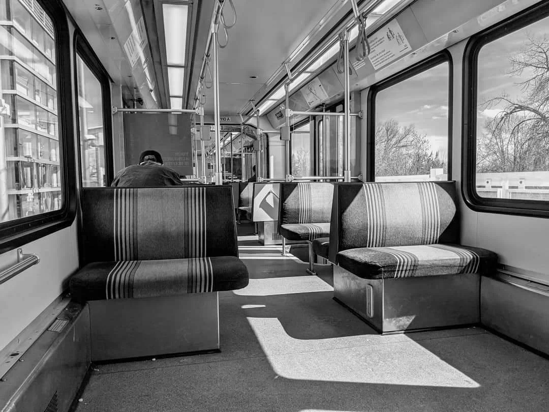 One lone commuter on the tram the day after people are ordered to quarantine during COVID-19 in Denver, Colorado