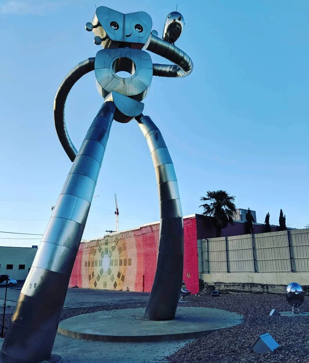 The Traveling Man metal sculpture stands in the Deep Ellum neighborhood in Dallas, Texas