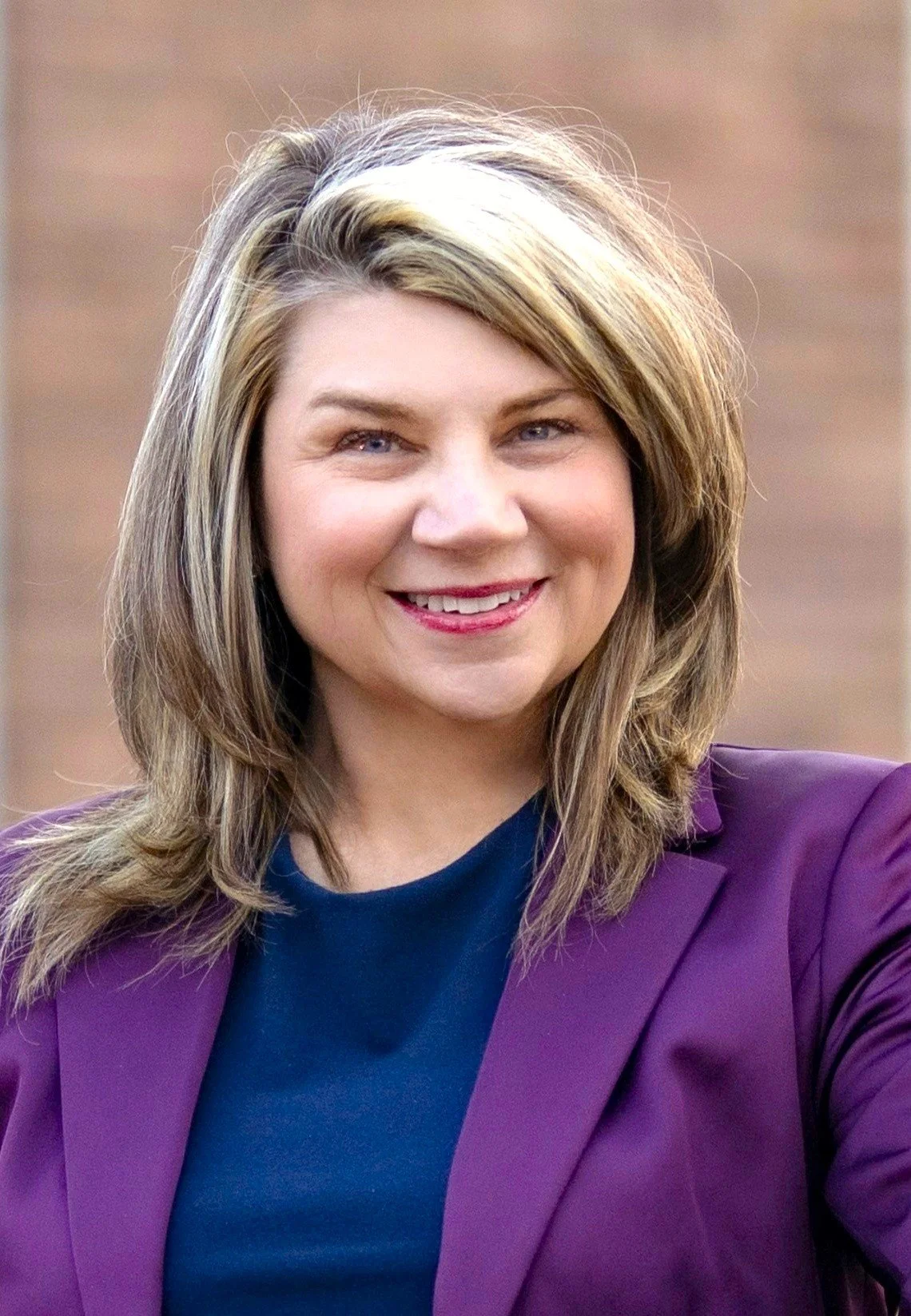 Nobility Wellness logo with a blue feather and the tagline 'Feel comfortable with your own thoughts and feelings'.