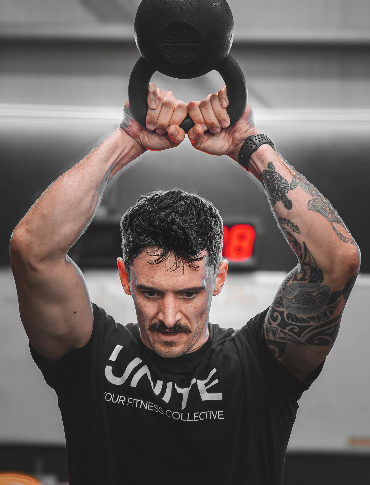 Man doing weights at a gym