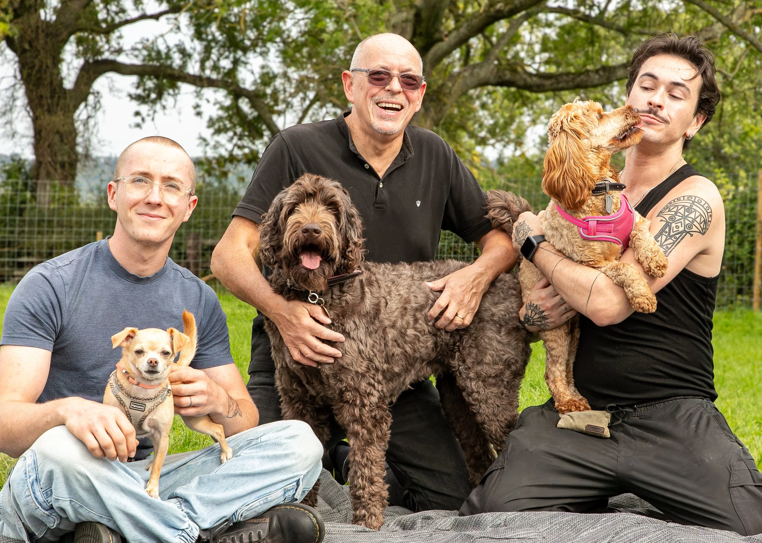 Family portrait with their dogs