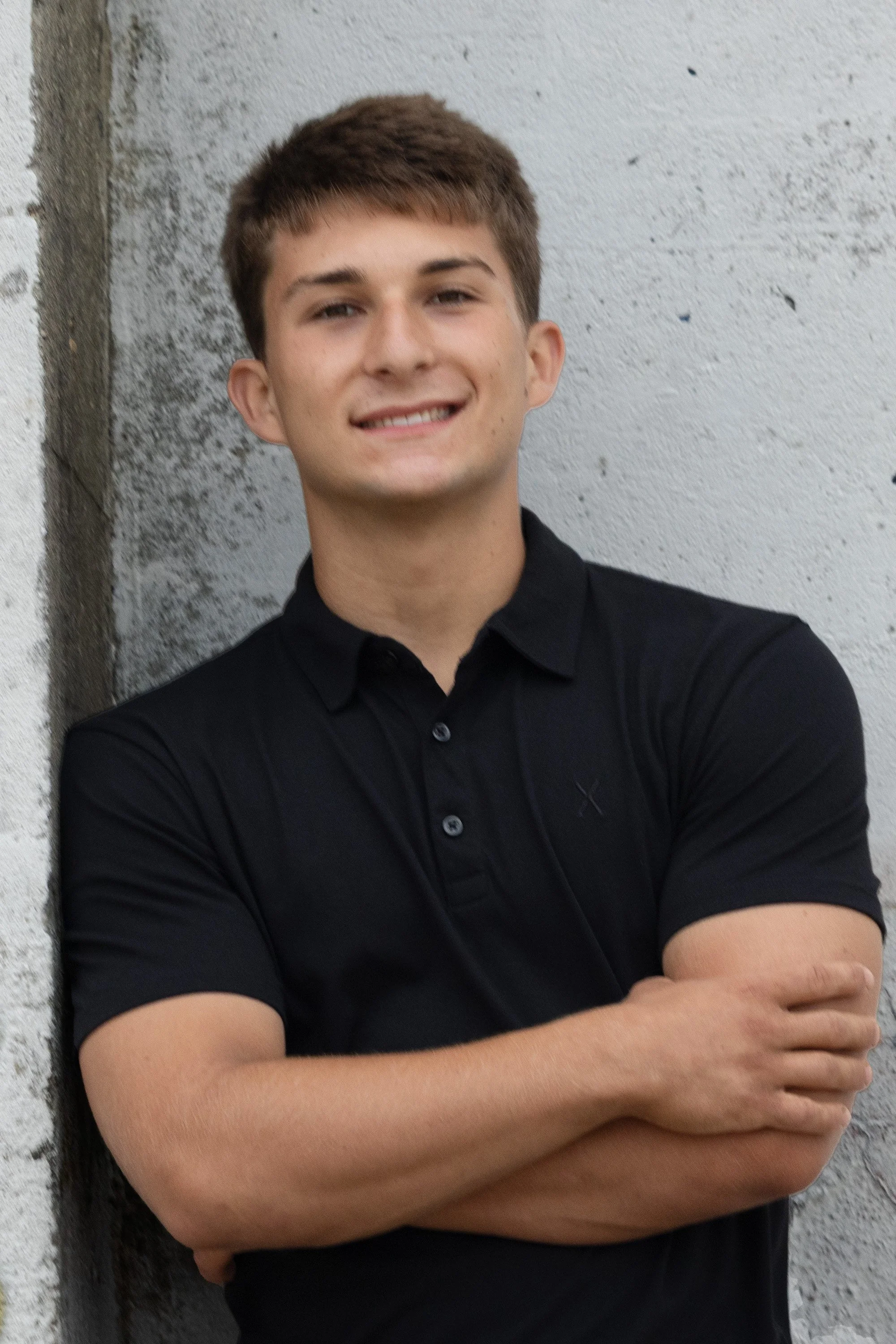 Modern high school senior portrait of a teenage boy photographed outdoors in Massachusetts by Kelliann Bachand Photography