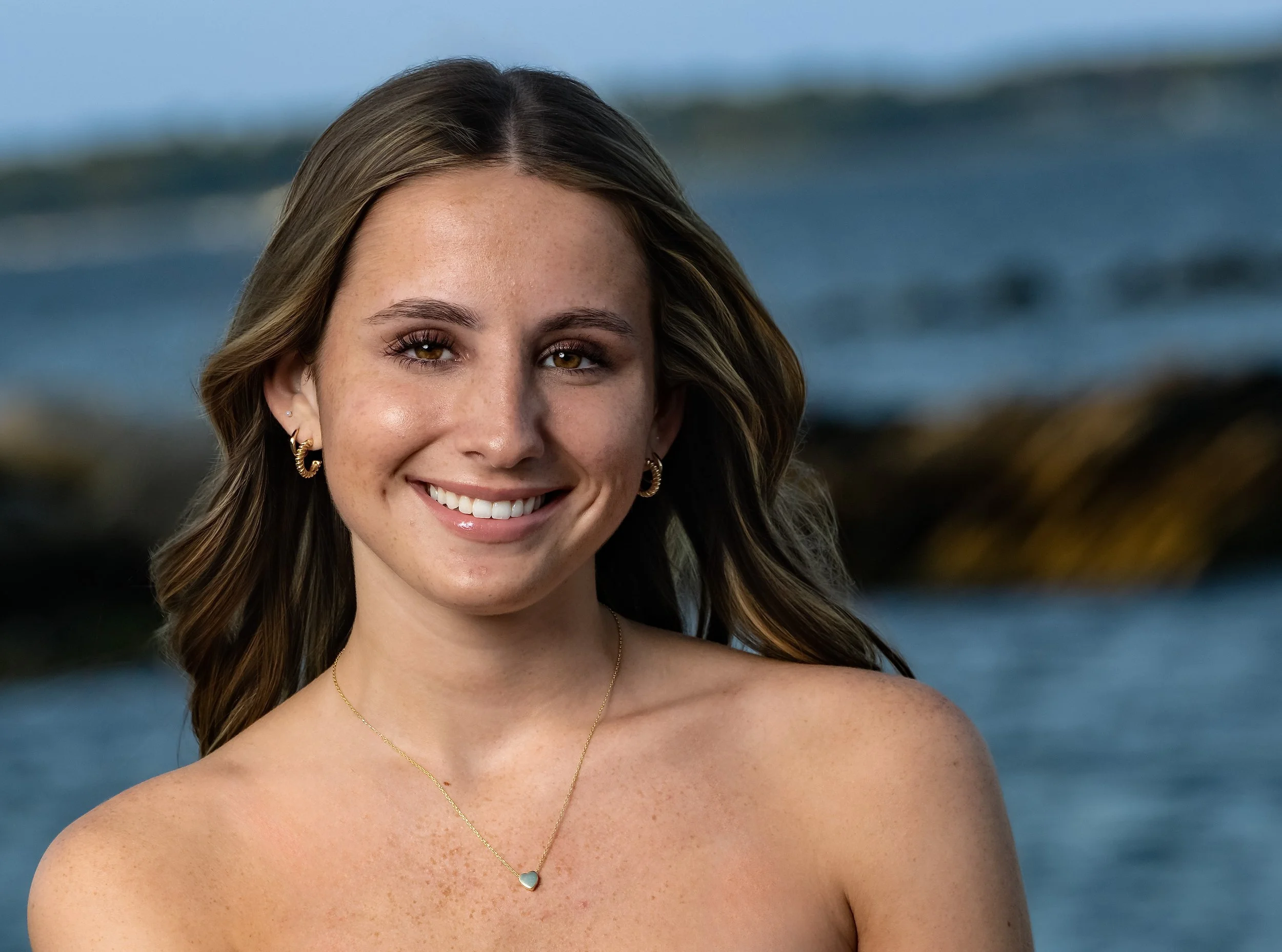 High school senior girl close up at Rocky Point State Park in Warwick, Rhode Island.