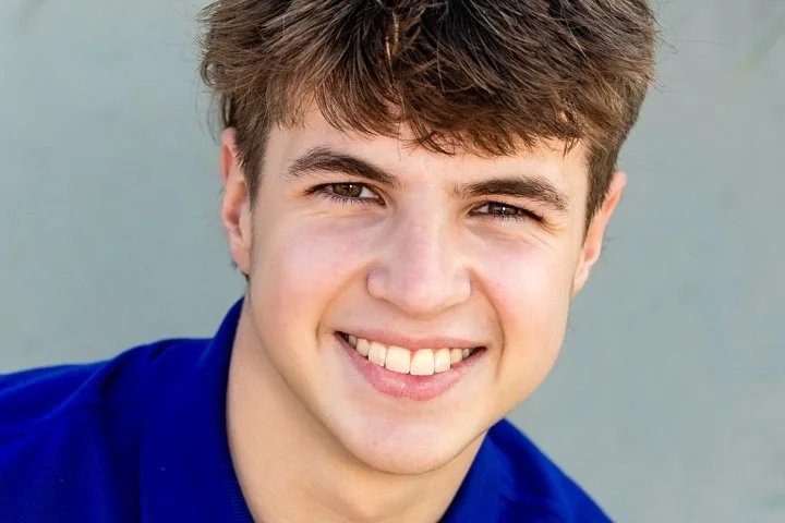 Classic high school senior portrait of a teenage boy photographed outdoors on Cape Cod by Kelliann Bachand Photography