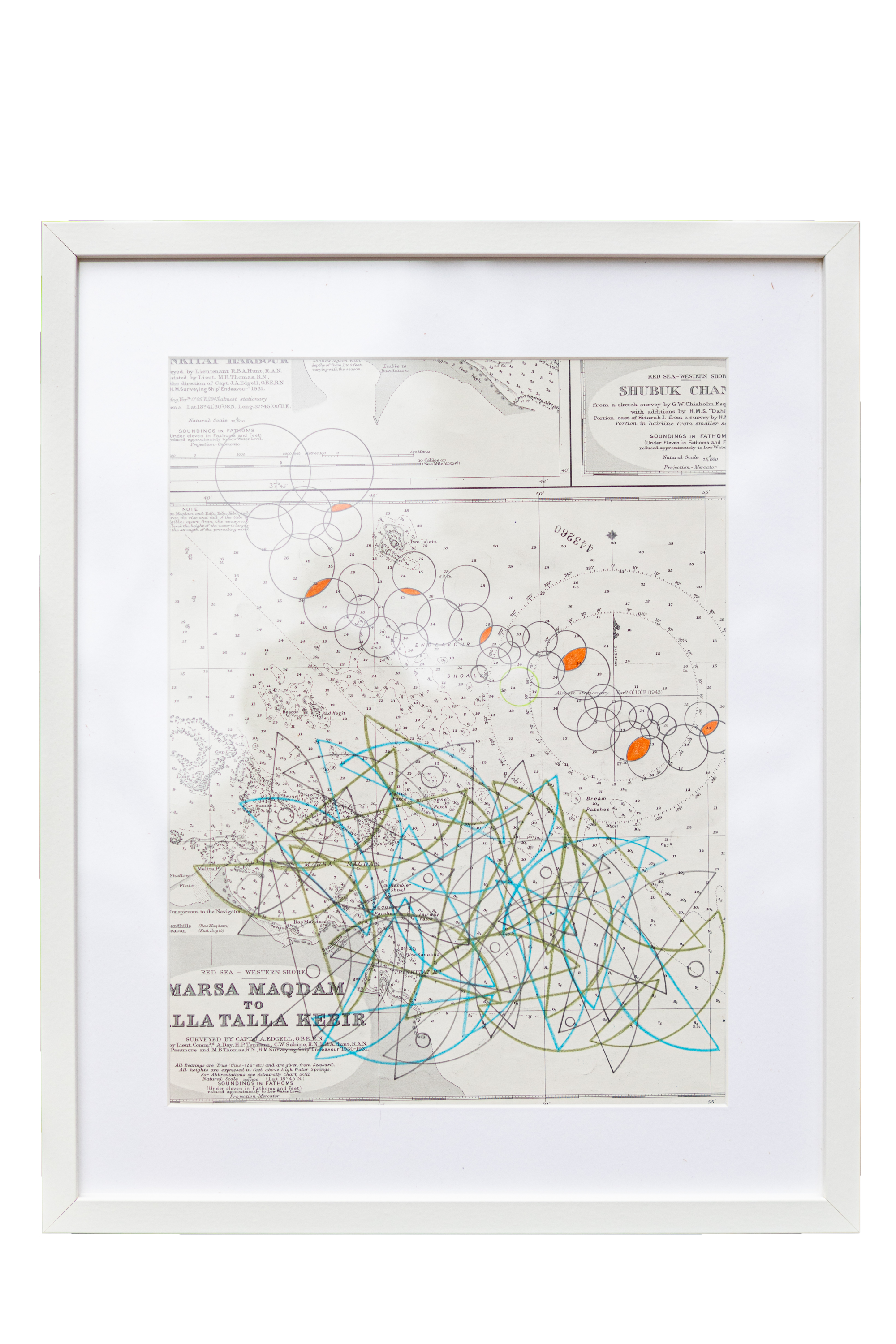 Framed nautical chart with geometric overlays, including colorful circles and lines.