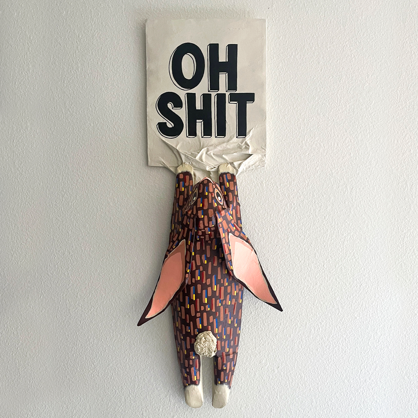 Hang In There, Rabbit Version, upcycled cardboard, paper maché and acrylic