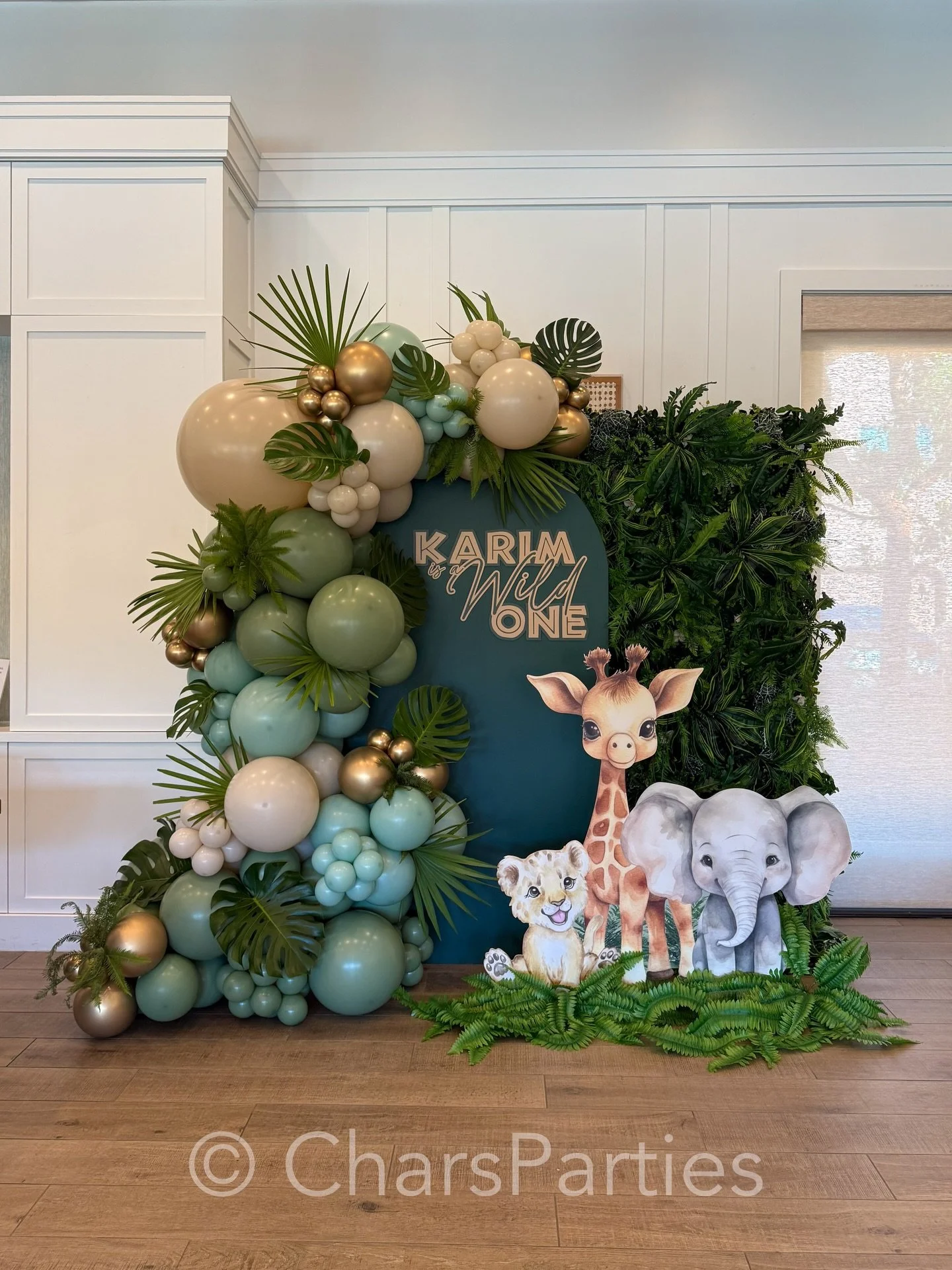 Karim is a WILD ONE! 
Jungle vibes, ultra saturated colors, rich texture, fresh foliage, and the cutest little wild animals bringing all the adventure to this adorable first birthday party! 🦁🦒🐘
.
Featuring our new 5D Tropical Jungle Flower Wall fr