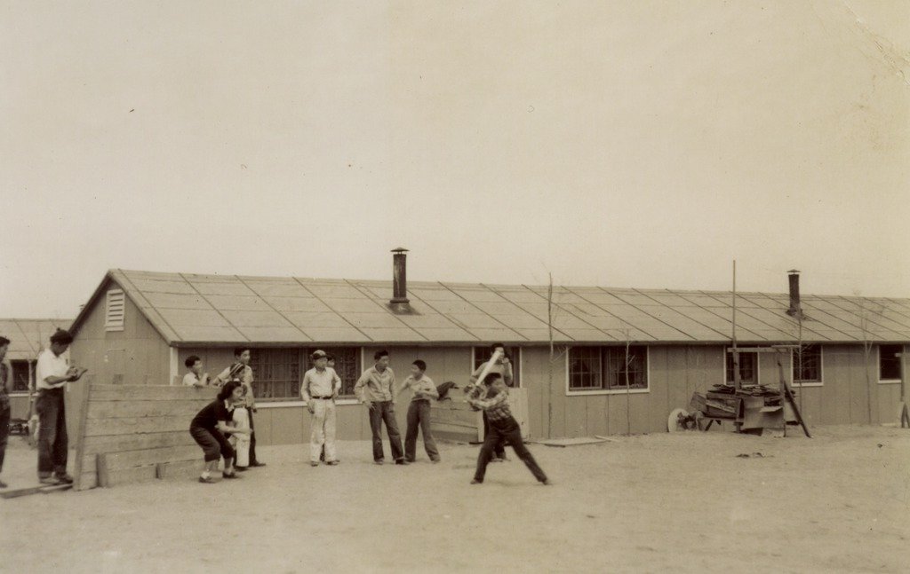Kids play baseball in the incarceration camp