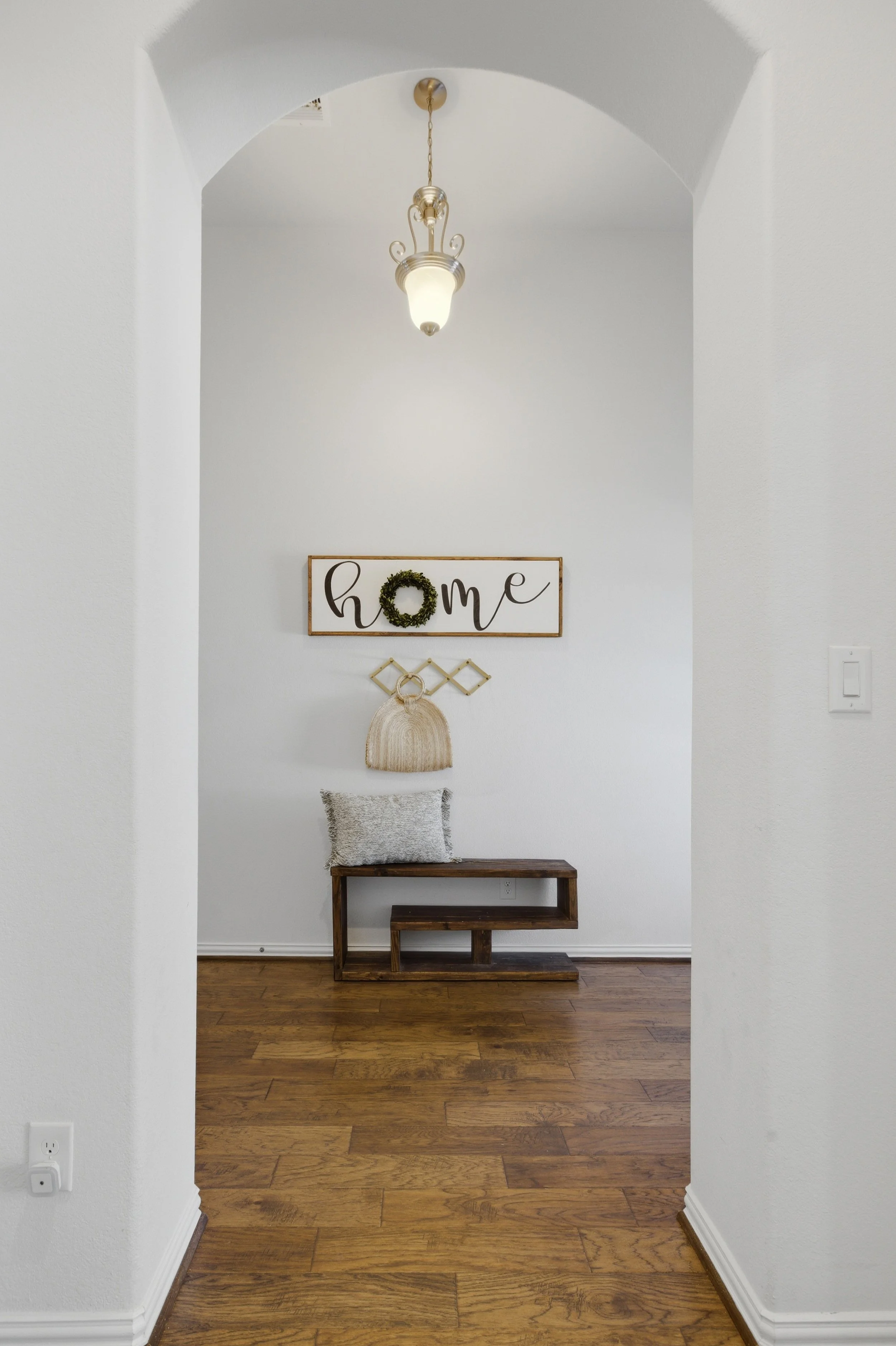 Bright entryway at 5386 Parma St Round Rock TX with high ceilings and open view into the main living space.