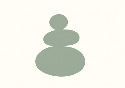 Stacked smooth stones, decreasing in size from bottom to top, on a neutral background.