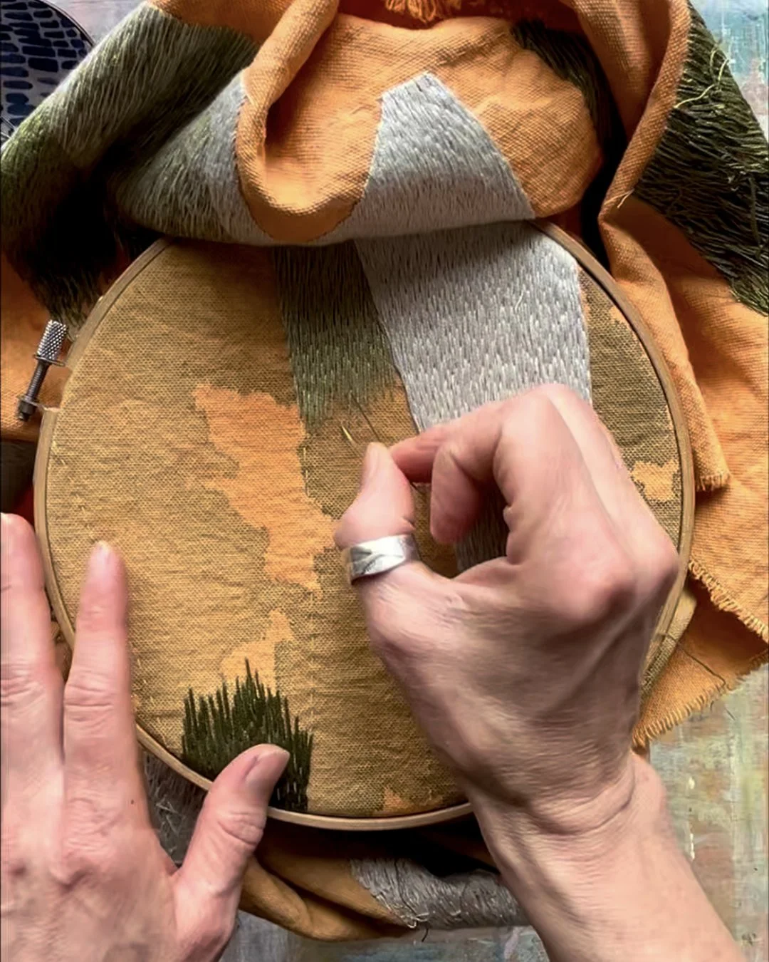 orange and green thread hand 2.jpg
