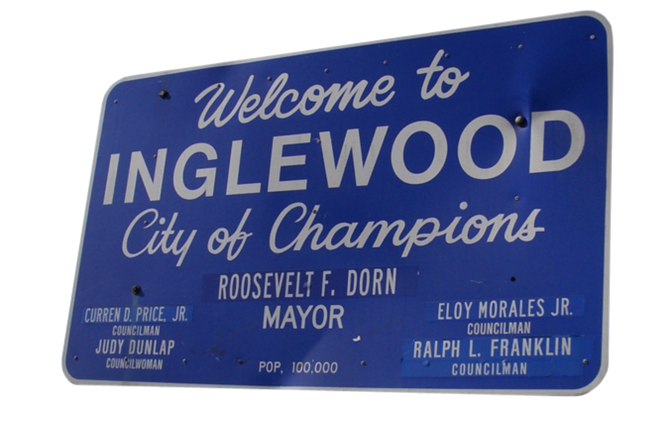 Blue road sign that read 'welcome to Inglewood, City of Champions'