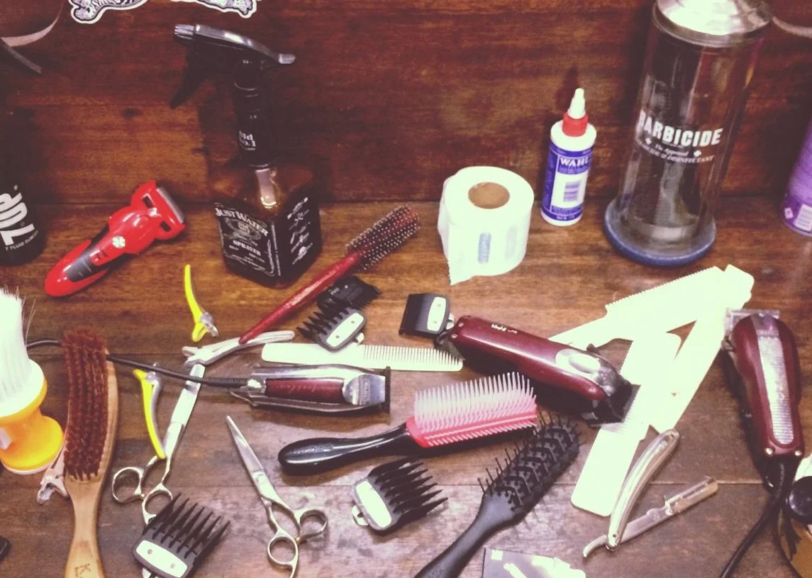 a table of men's hair grooming products
