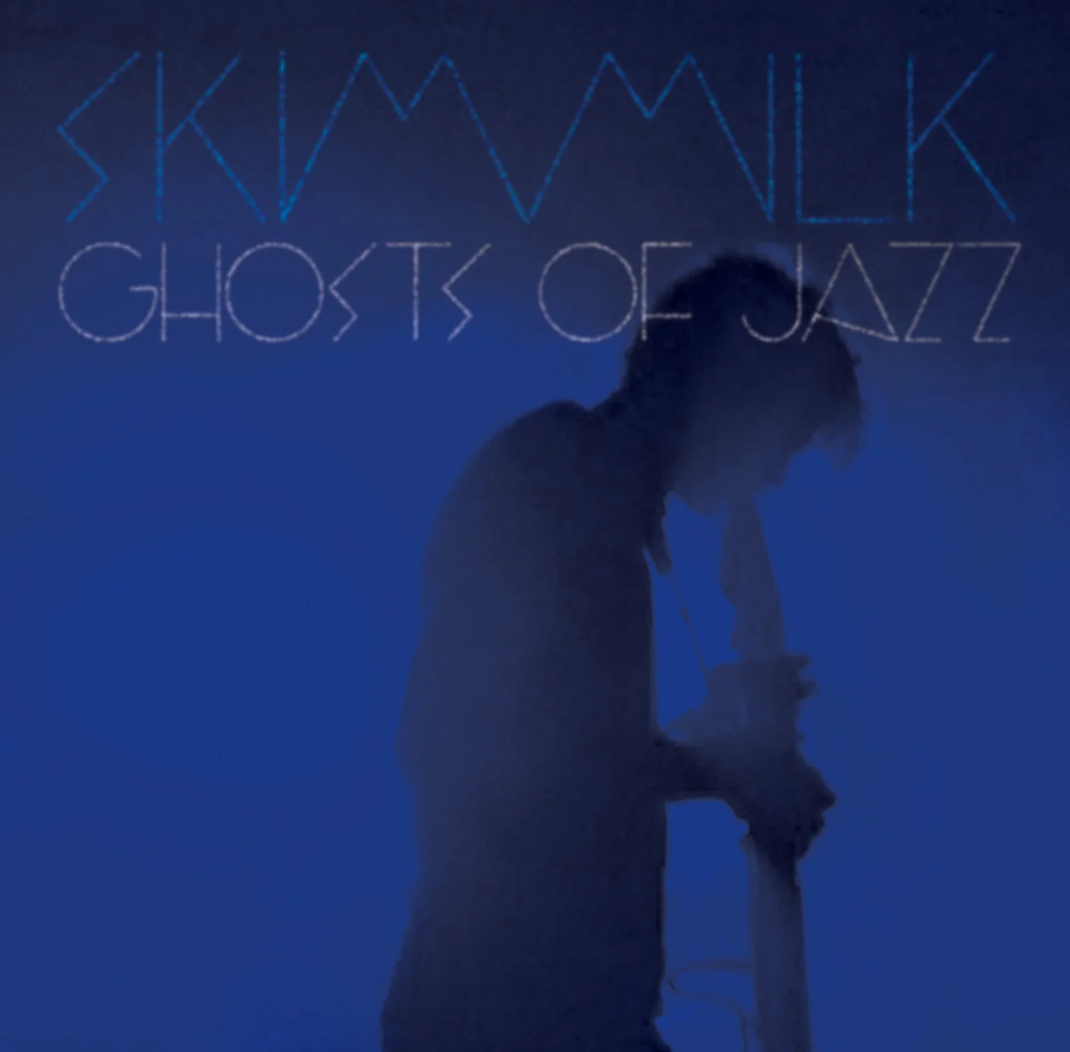Hazy blue background with a silhouette of Sam playing EWI.