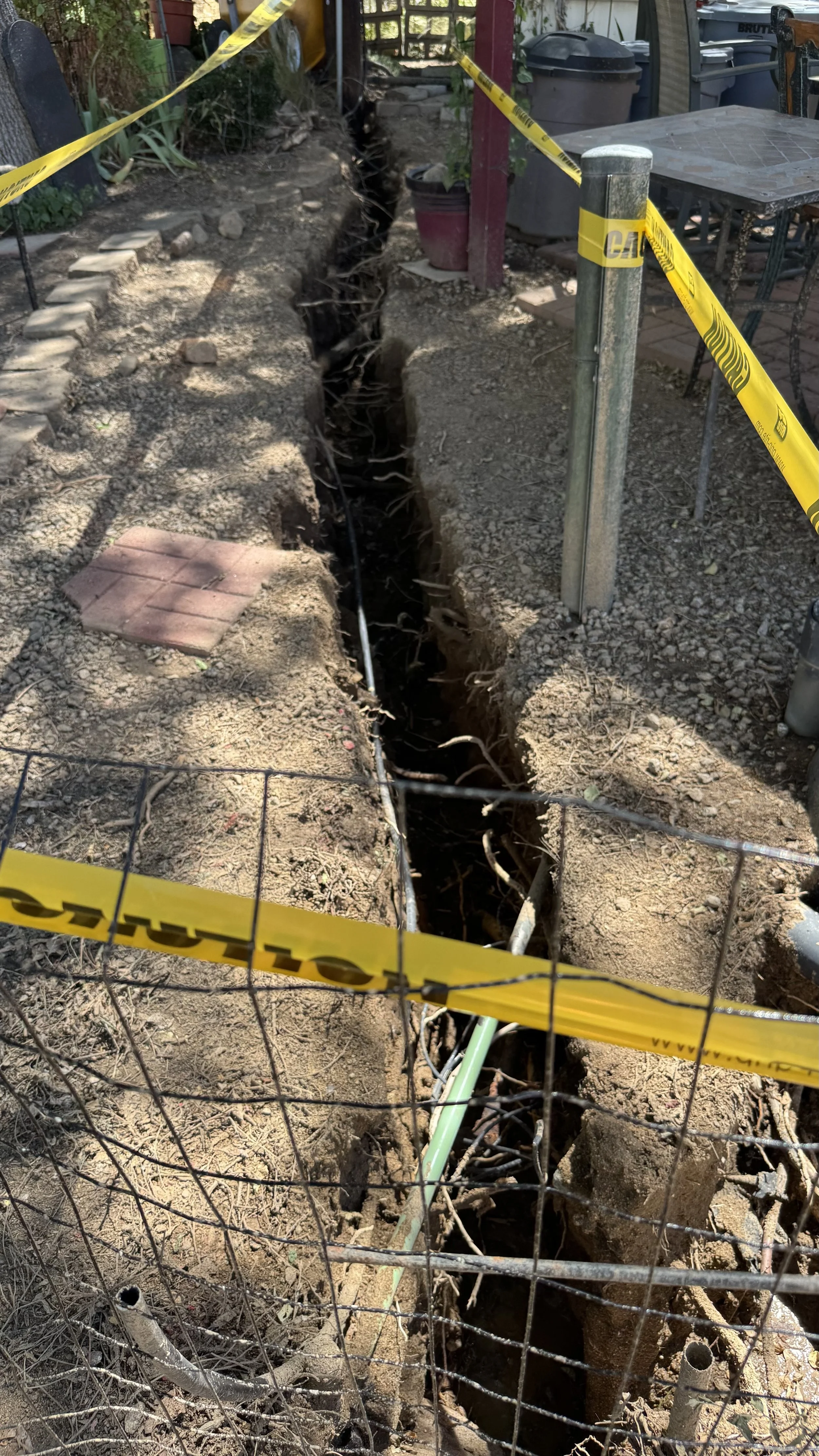 Trench for power conduit through multiple underground utilities- Prescott, Az