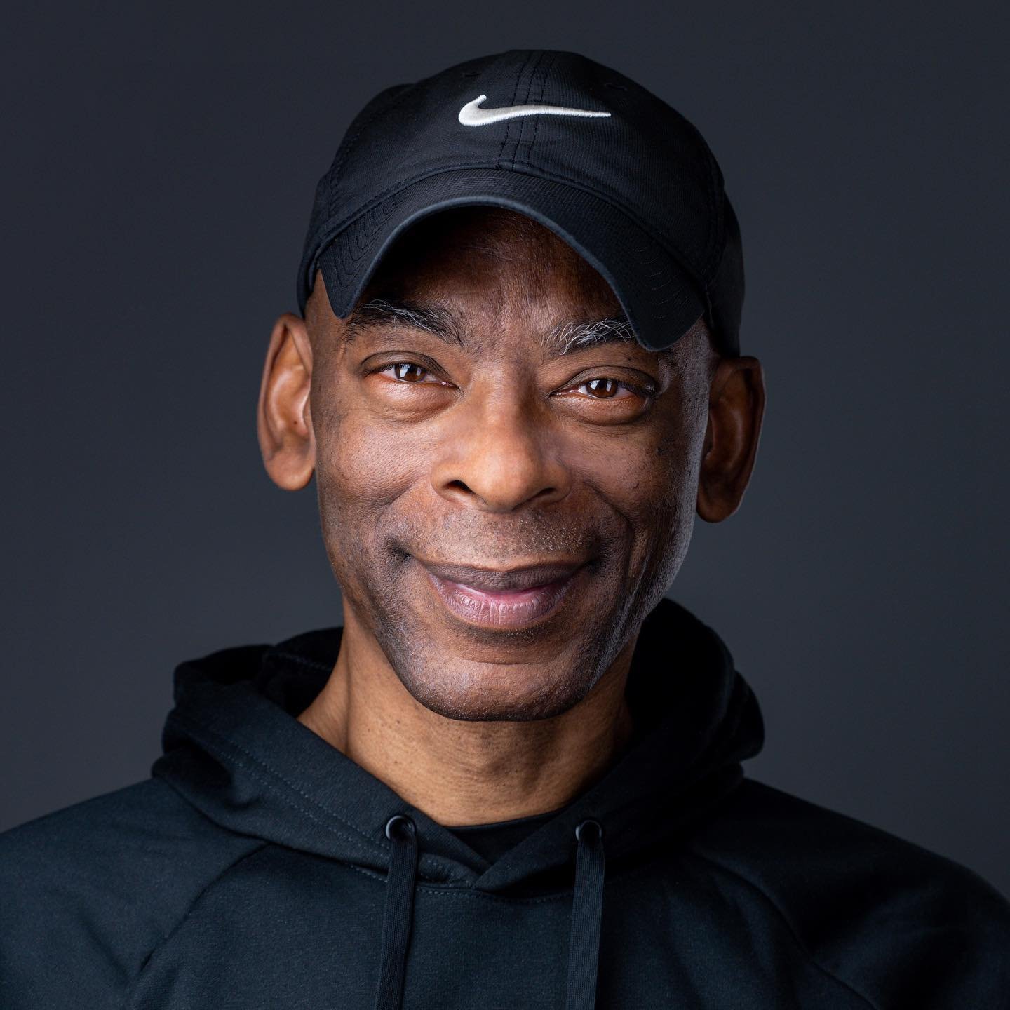 Should you be wearing a suit and tie in your headshot? 

Not necessarily! In this recent headshot photoshoot, Willis , a PE teacher in New York City, rocked his baseball cap and sportwear outfit. A great headshot should reflect who you are and the in