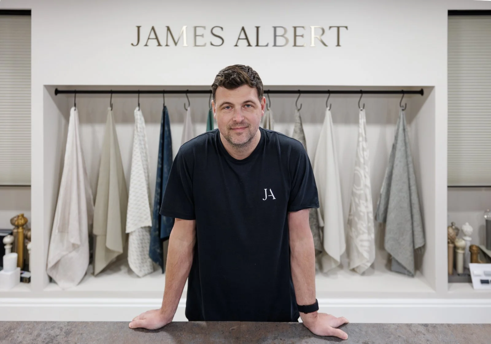 James Albert stood in his preston showroom
